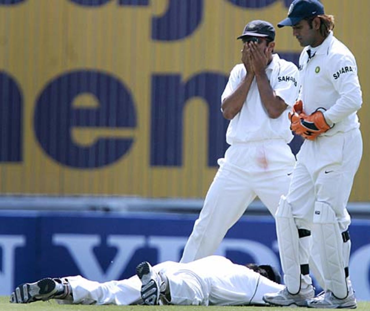 Rahul Dravid buries his face in the turf after dropping Kevin Pietersen, India v England, 1st Test, Nagpur, 1st day, March 1 2006