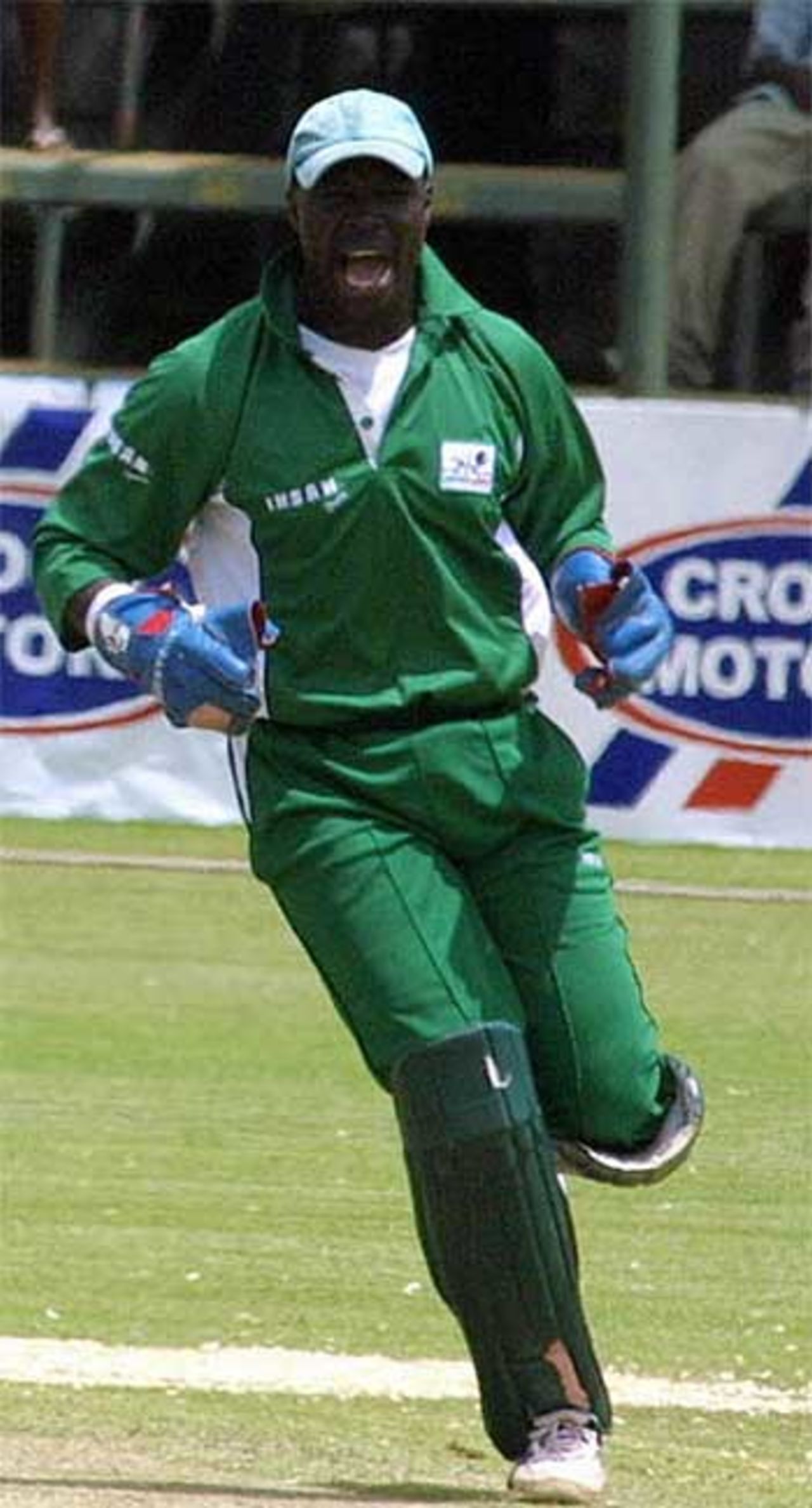 Kennedy Otieno celebrates a wicket ... but Kenya ultimately lost, Zimbabwe v Kenya, 4th ODI, Harare, March 3, 2006

