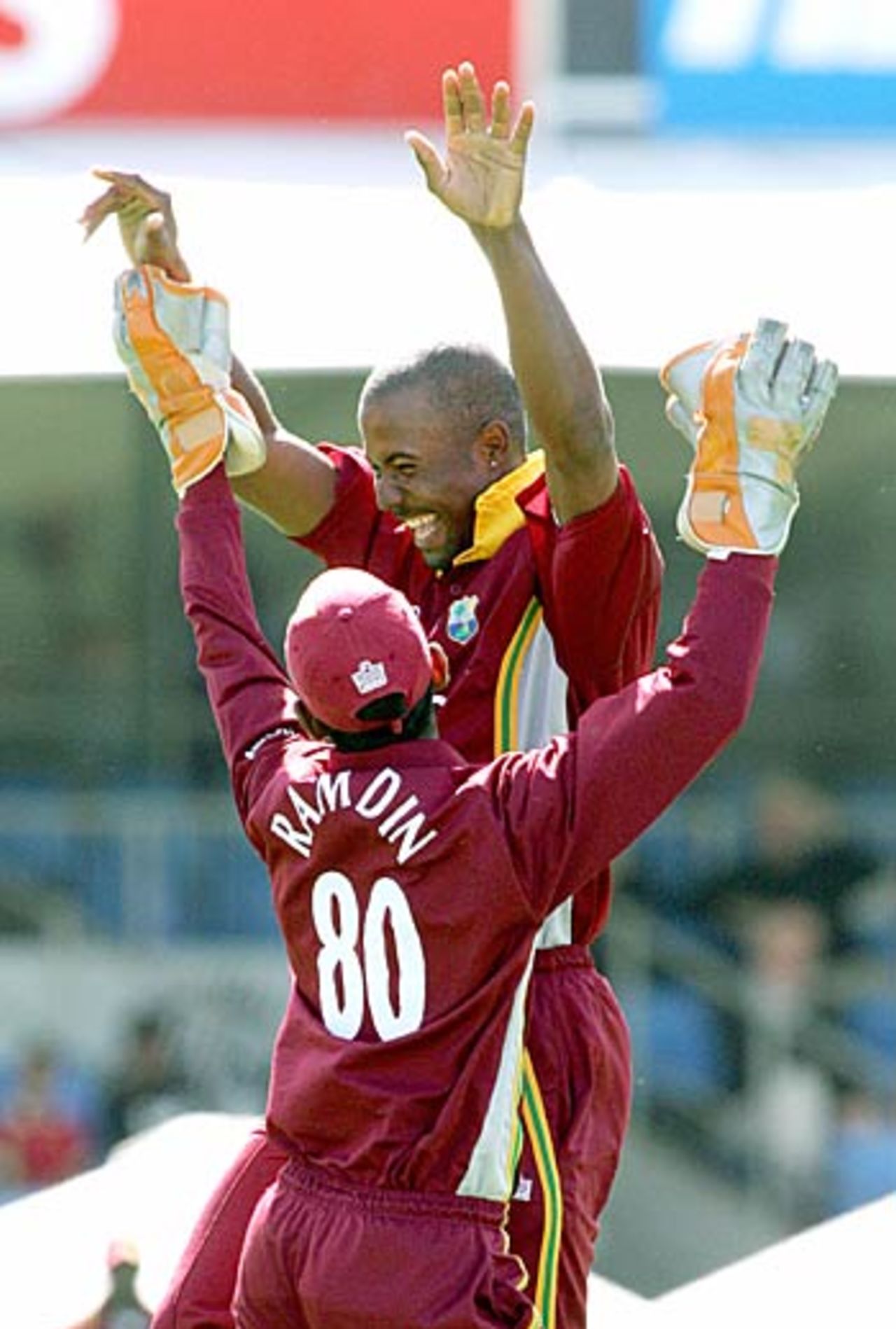 Dwayne Smith and Denesh Ramdin celebrate the wicket of Stephen Fleming, New Zealand v West Indies, 5th ODI, Auckland, March 4, 2006