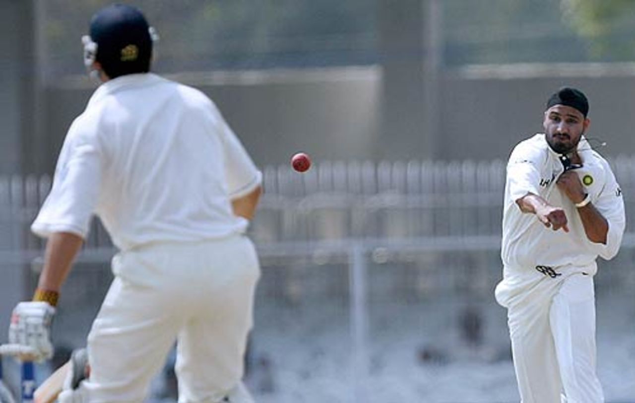 Harbhajan Singh throws the ball back at Alastair Cook, India v England, Nagpur, March 4, 2006