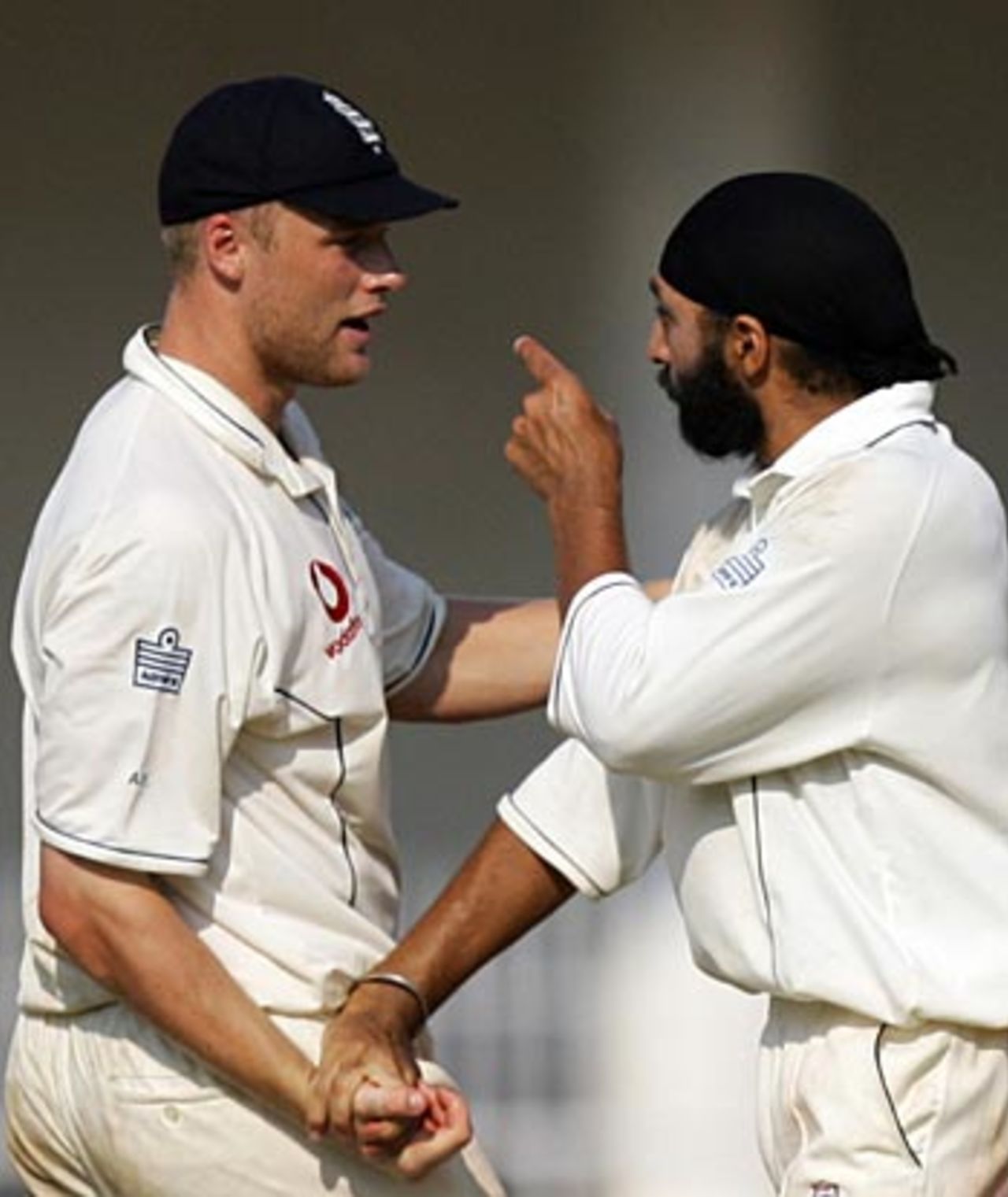 Monty Panesar and Andrew Flintoff after Rahul Dravid's dismissal, India v England, 1st Test, Nagpur, March 5, 2006