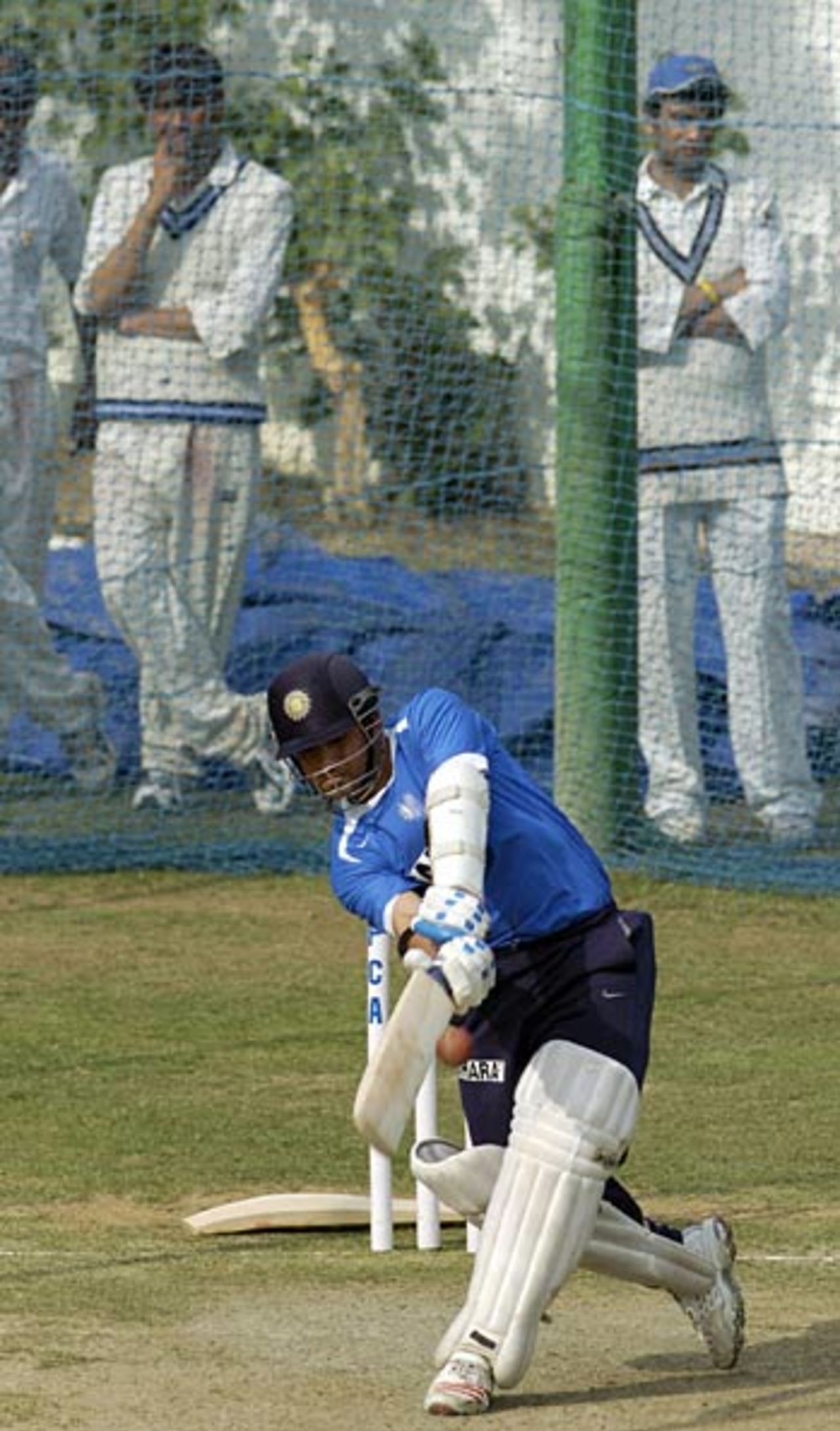 Sachin Tendulkar bats in the nets at Mohali, watched by some interested youngsters, Mohali, March 7, 2006