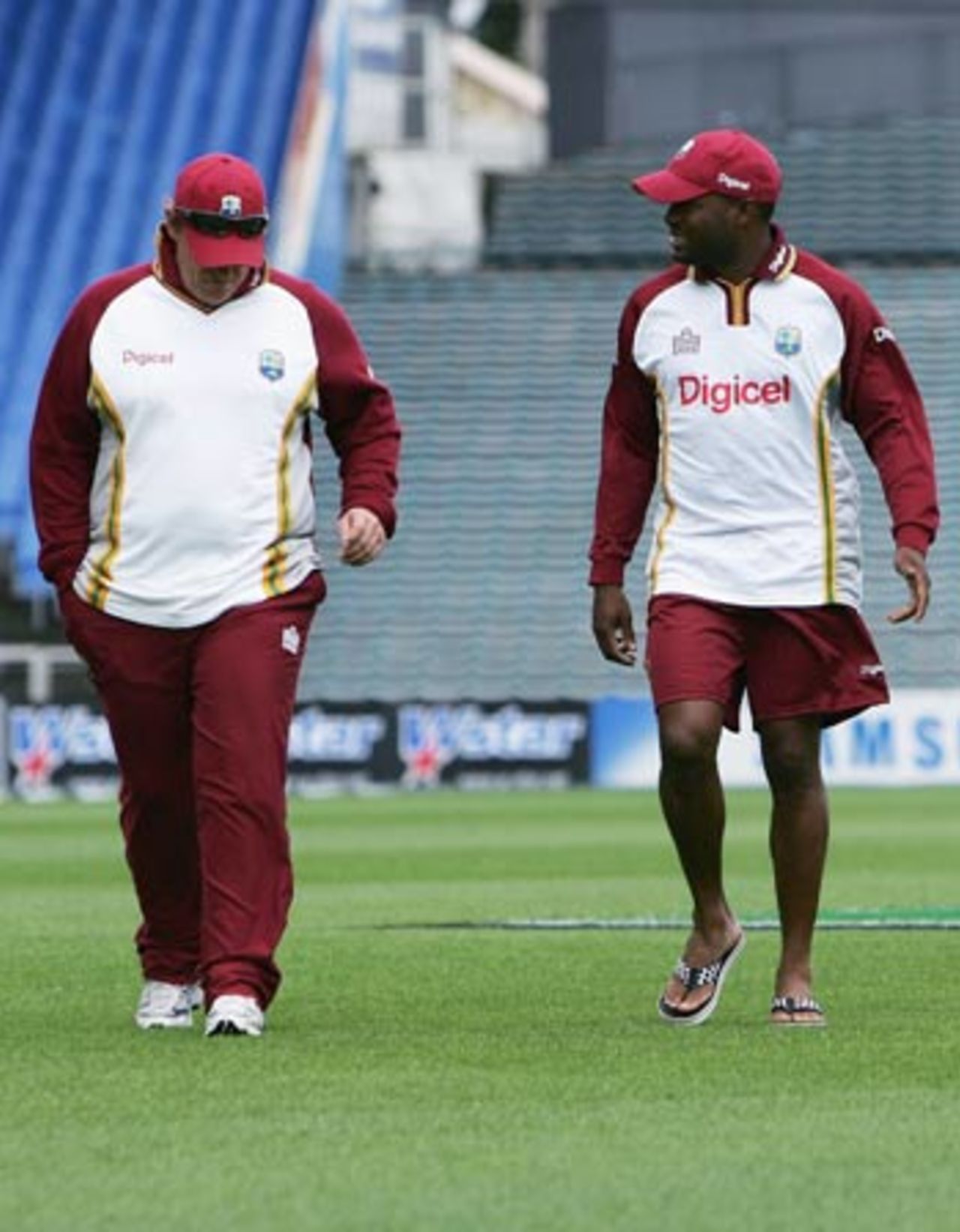 Brian Lara and David Moore, the assistant coach, do the rounds of Eden Park, Auckland, March 8, 2006