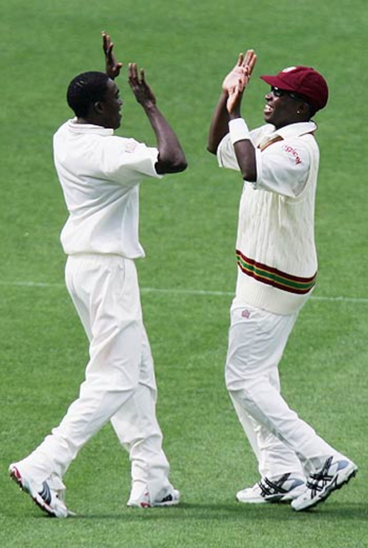 Fidel Edwards and Jerome Taylor celebrate Hamish Marshall's wicket, New Zealand v West Indies, 1st Test, Auckland, 1st day, March 9, 2006