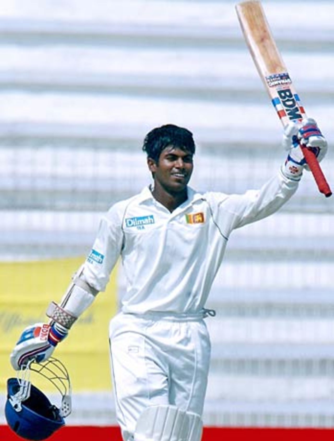 Upul Tharanga savours the moment after reaching his maiden ton, Bangladesh v Sri Lanka, 2nd Test, Bogra, 2nd day, March 9, 2006