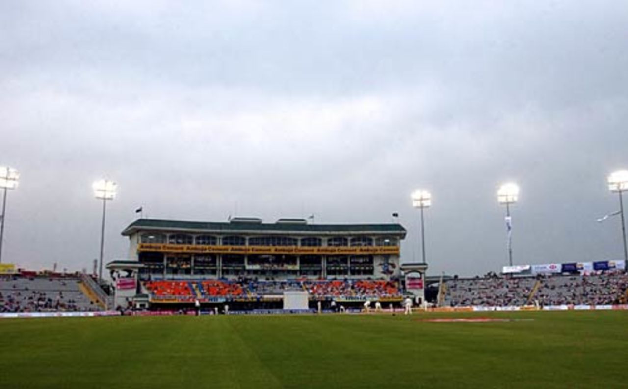 Lights are switched on as cloud cover ruined the light at Mohali stadium, India v England, 2nd Test, Mohali, 1st day, March 9, 2006 