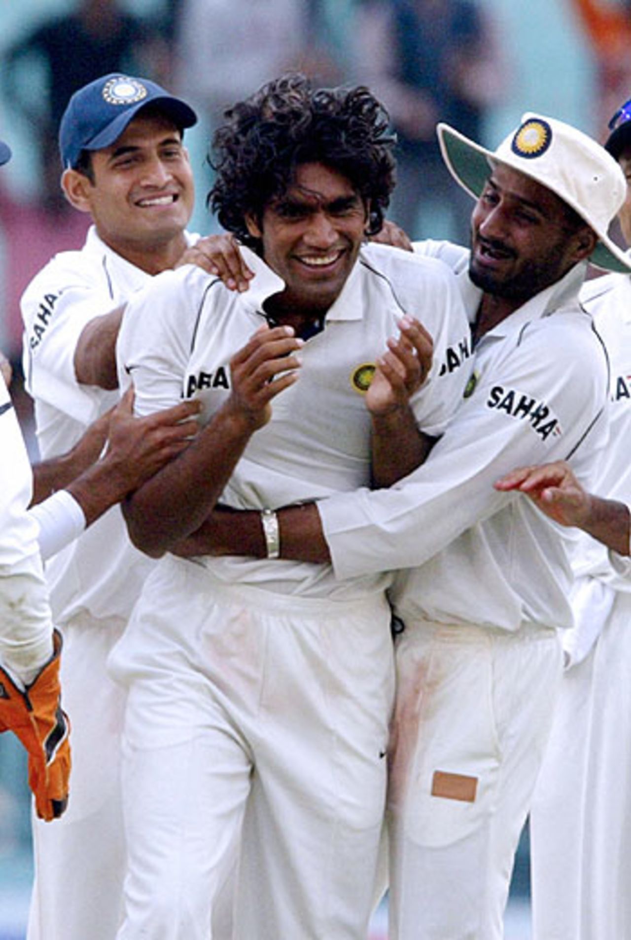 Munaf Patel is mobbed by his team-mates after dismissing Kevin Pietersen, India v England, 2nd Test, Mohali, March 9, 2006