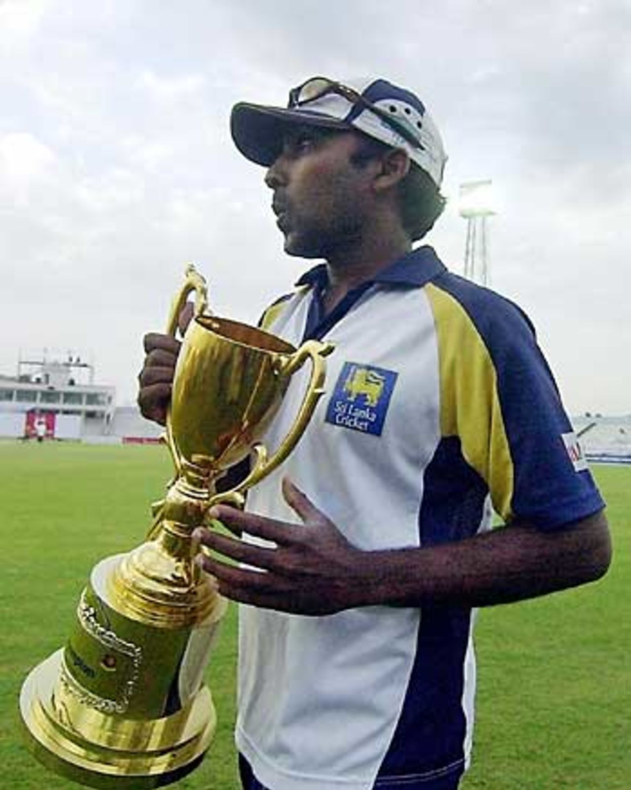 Mahela Jayawardene poses with the trophy after beating Bangladesh 2-0, Bangladesh v Sri Lanka, 2nd Test, Bogra, 4th day, March 11 2006