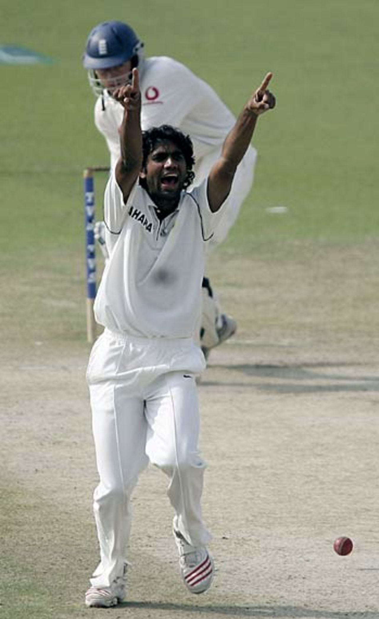 Munaf Patel traps Liam Plunkett with an inswinger, his eighth wicket of the match, as India take control, India v England, 2nd Test, Mohali, March 12, 2006