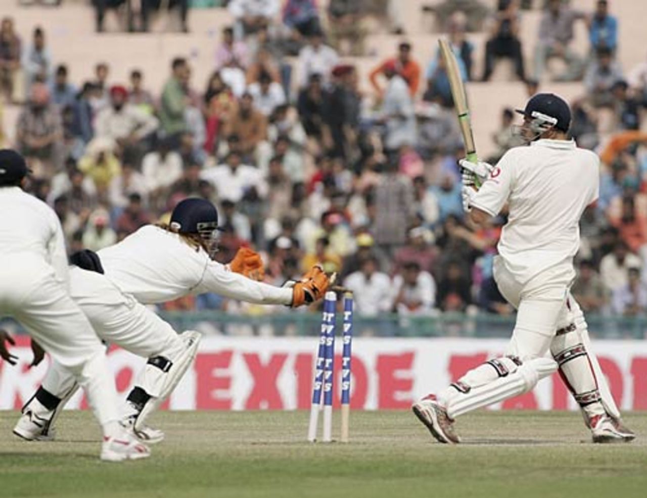 In a flash: Mahendra Singh Dhoni whips off the bails to stump Steve Harmison, India v England, 2nd Test, Mohali, 5th day, March 13 2006