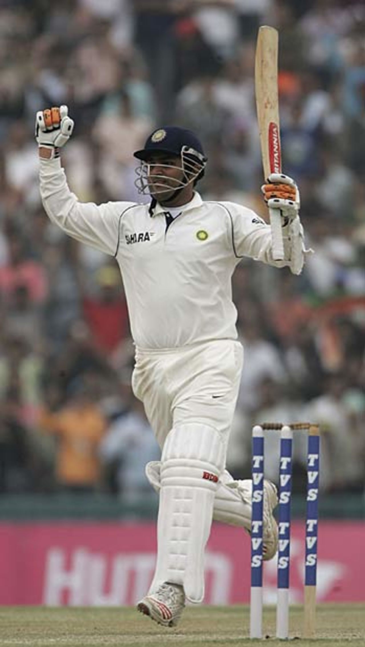 Virender Sehwag celebrates hitting the winning run, India v England, 2nd Test, Mohali, March 13, 2006