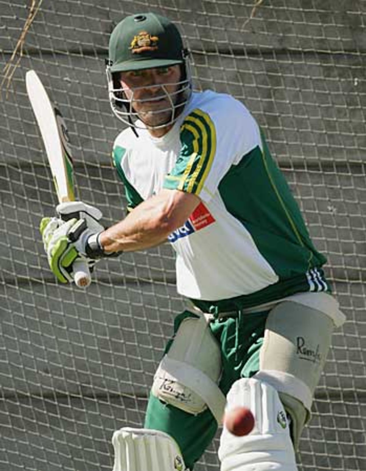 Damien Martyn keeps a close eye on the ball during a net session ahead of the first Test, South Africa v Australia, Cape Town, March 15, 2006