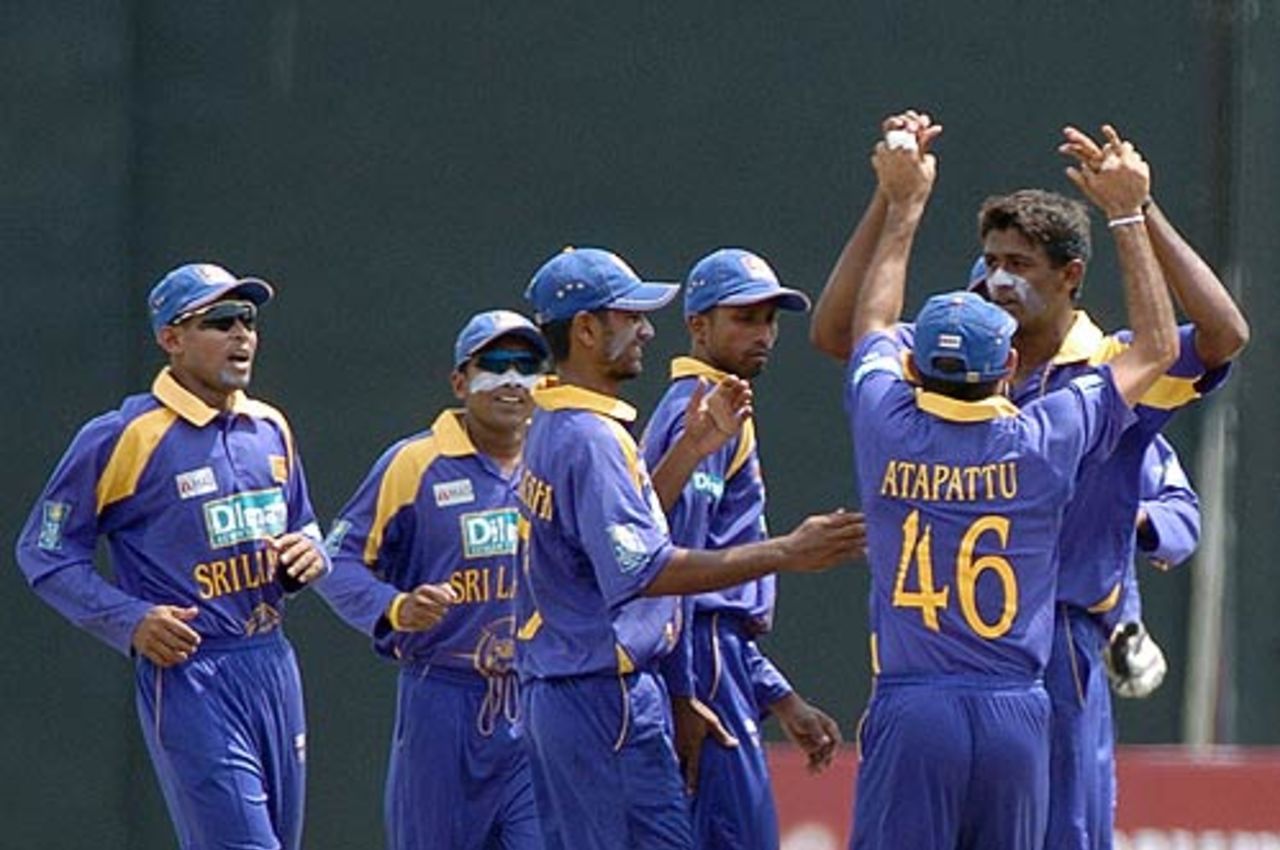 Farveez Maharoof is congratulated by his team-mates for dismissing Kamran Akmal, Sri Lanka v Pakistan, 1st ODI, Colombo (RPS), March 17 2006
