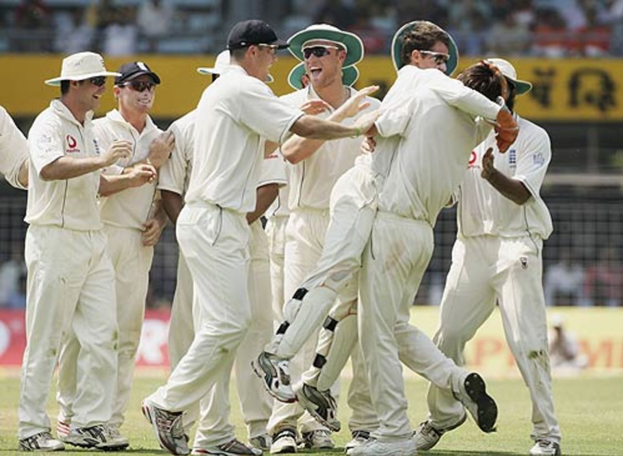 England savour the moment after taking another wicket, India v England, 3rd Test, Mumbai, 3rd day, March 20 2006
