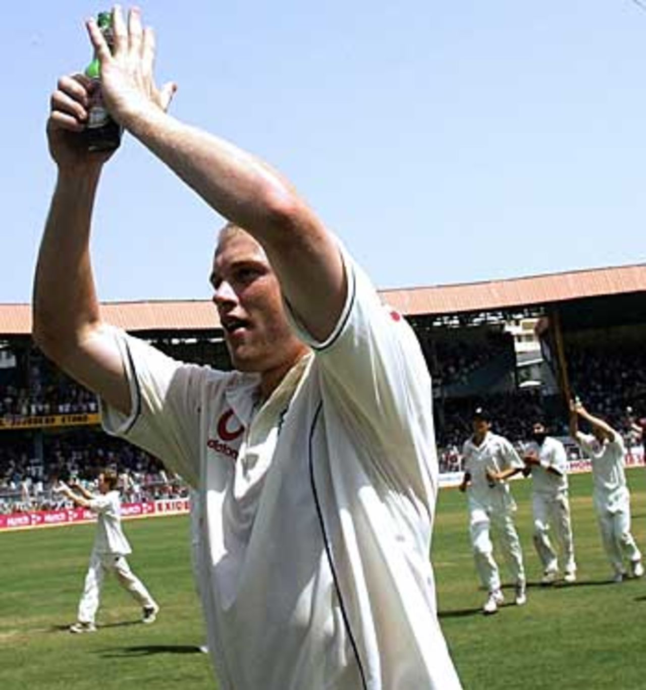 Leading by example: the England captain Andrew Flintoff applauds his team, India v England, 3rd Test, Mumbai, March 22, 2006