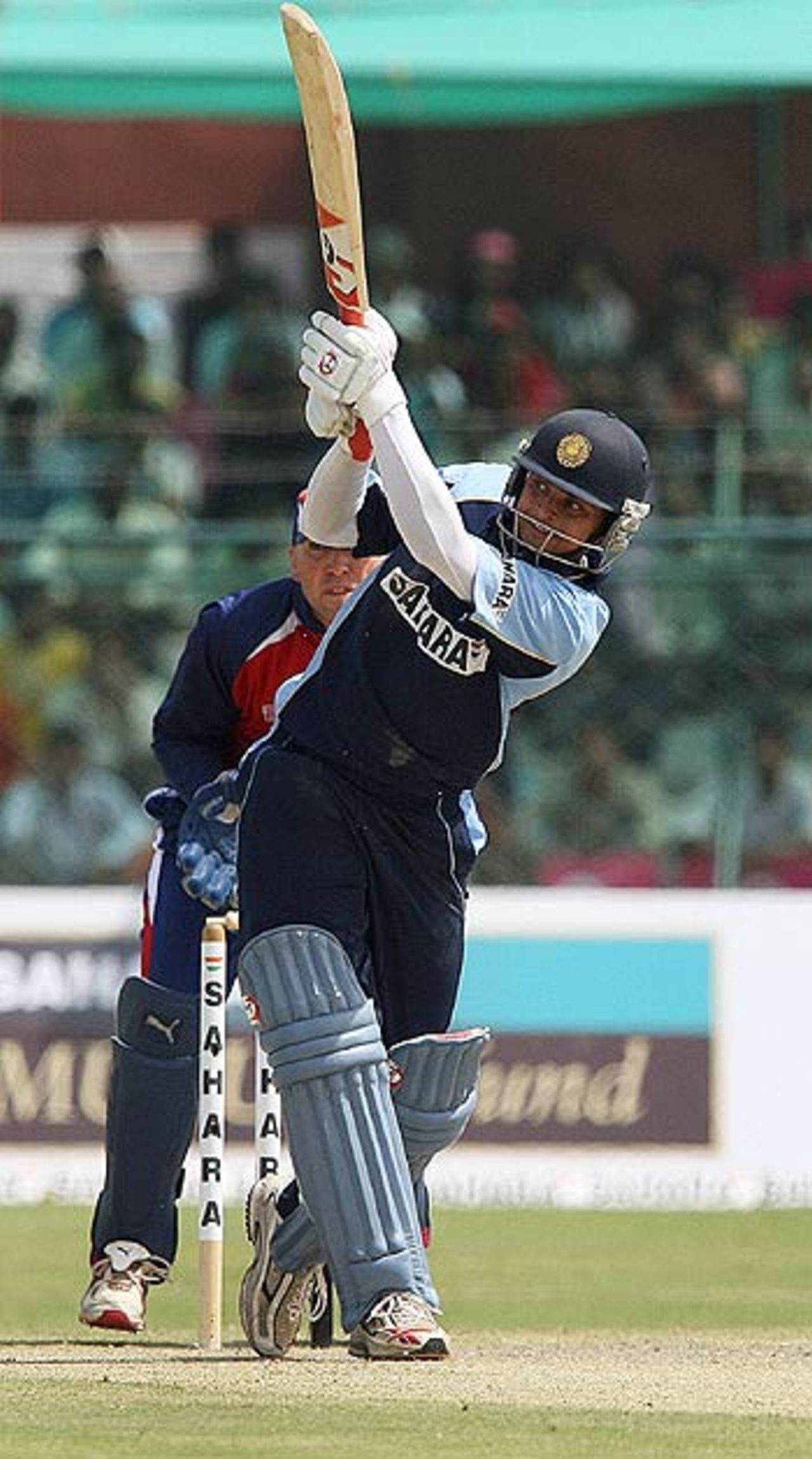 Suresh Raina lofts one off the legs during his 46-ball 49 against the England XI, Rajasthan Cricket Association President's XI v England XI, Jaipur, March 25, 2006
