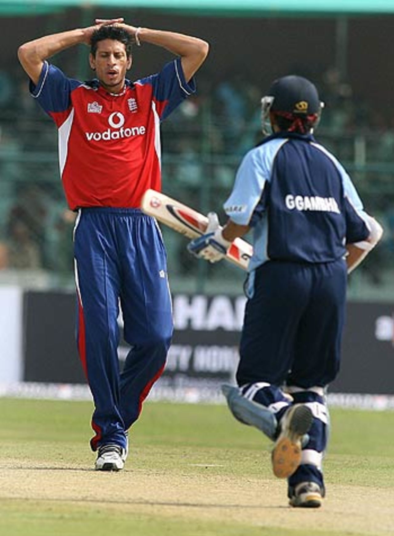 Sajid Mahmood reacts as Gautam Gambhir pinches a run during the tour match at Jaipur, Rajasthan Cricket Association President's XI v England XI, Jaipur, March 25, 2006