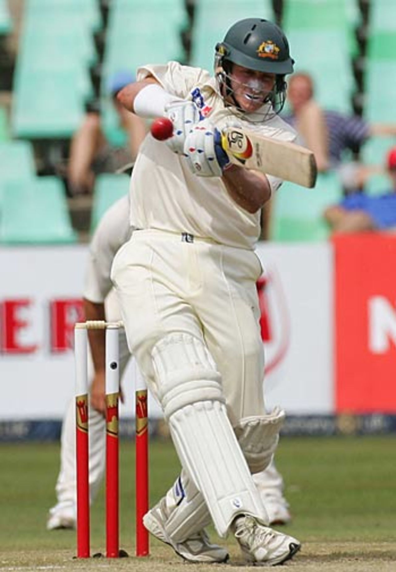Mike Hussey connects with a pull on a tough second morning for Australia, South Africa v Australia, 2nd Test, Durban, March 25, 2006