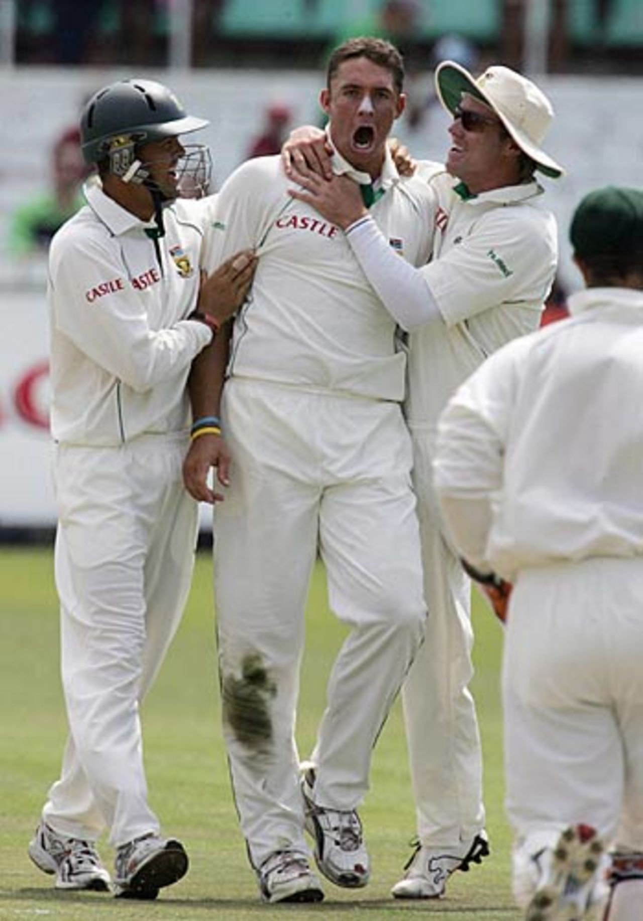 Andre Nel is congratulated by his team-mates after removing Andrew Symonds, South Africa v Australia, 2nd Test, Durban, March 25, 2006