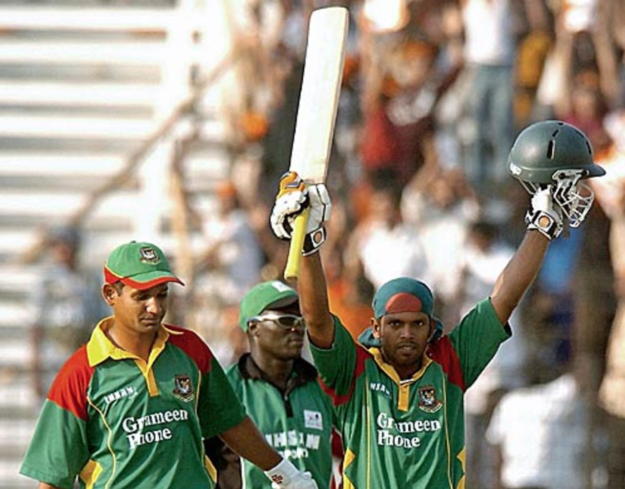 Rajin Saleh celebrates reaching his century as Bangladesh power to victory, Bangladesh v Kenya, 4th ODI, Fatullah, March 25, 2006
