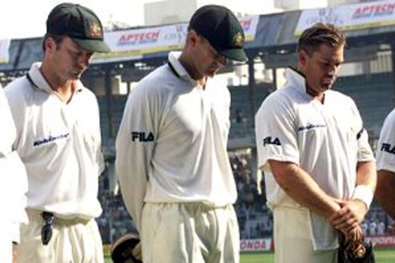 27 Feb 2001: Steve Waugh, Adam Gilchrist and Shane Warne of Australia observe a minute's silence for the death of Sir Donald Bradman, during day one of the first test between India and Australia, played Wankhede Stadium, Mumbai, India.