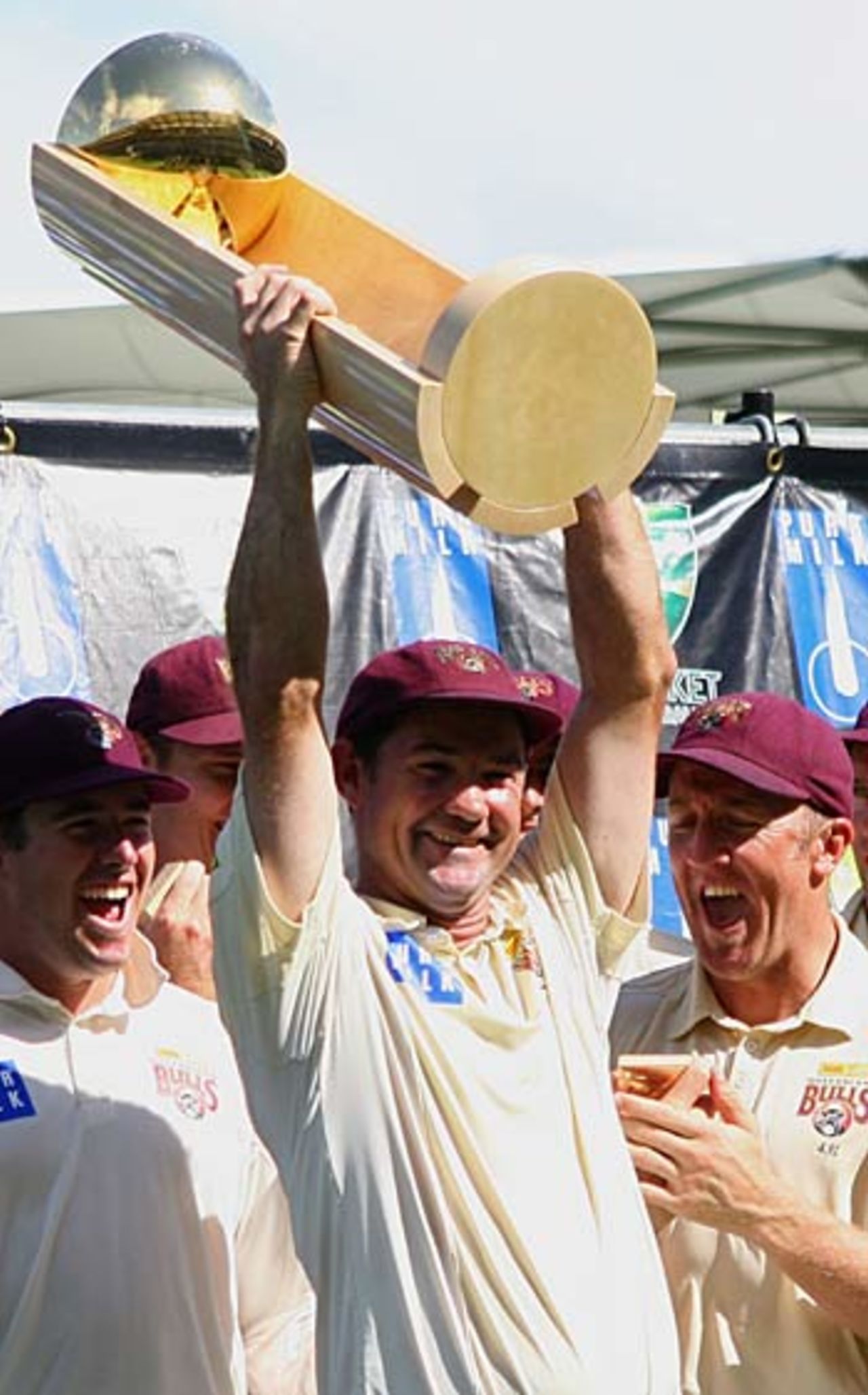 Jimmy Maher lifts the Pura Cup after Queensland's massive victory, Queensland v Victoria, Pura Cup final, Brisbane, 5th day, March 28, 2006