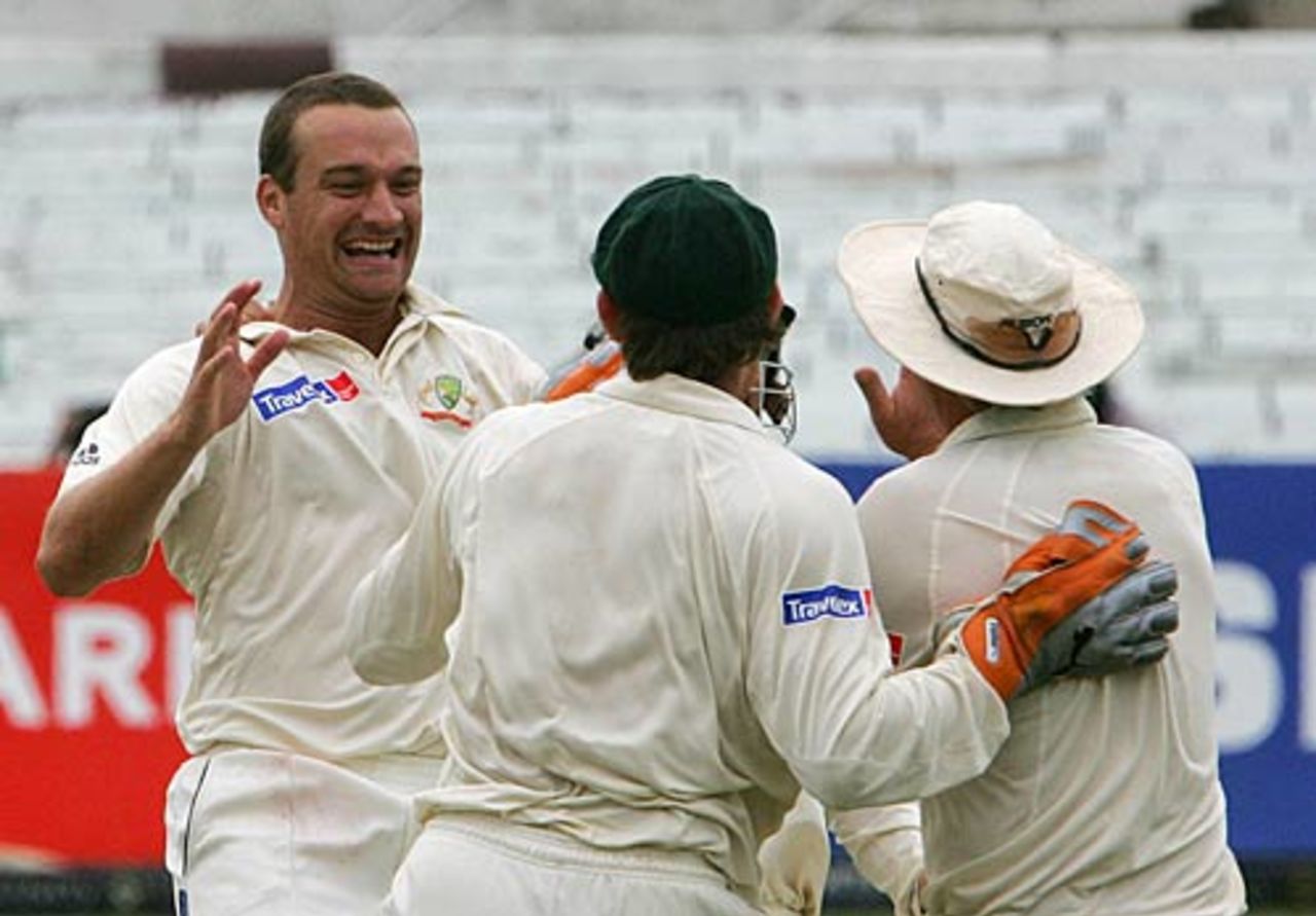 Stuart Clark celebrates with his team-mates after removing Herschelle Gibbs, South Africa v Australia, 2nd Test, Durban, March 28, 2006