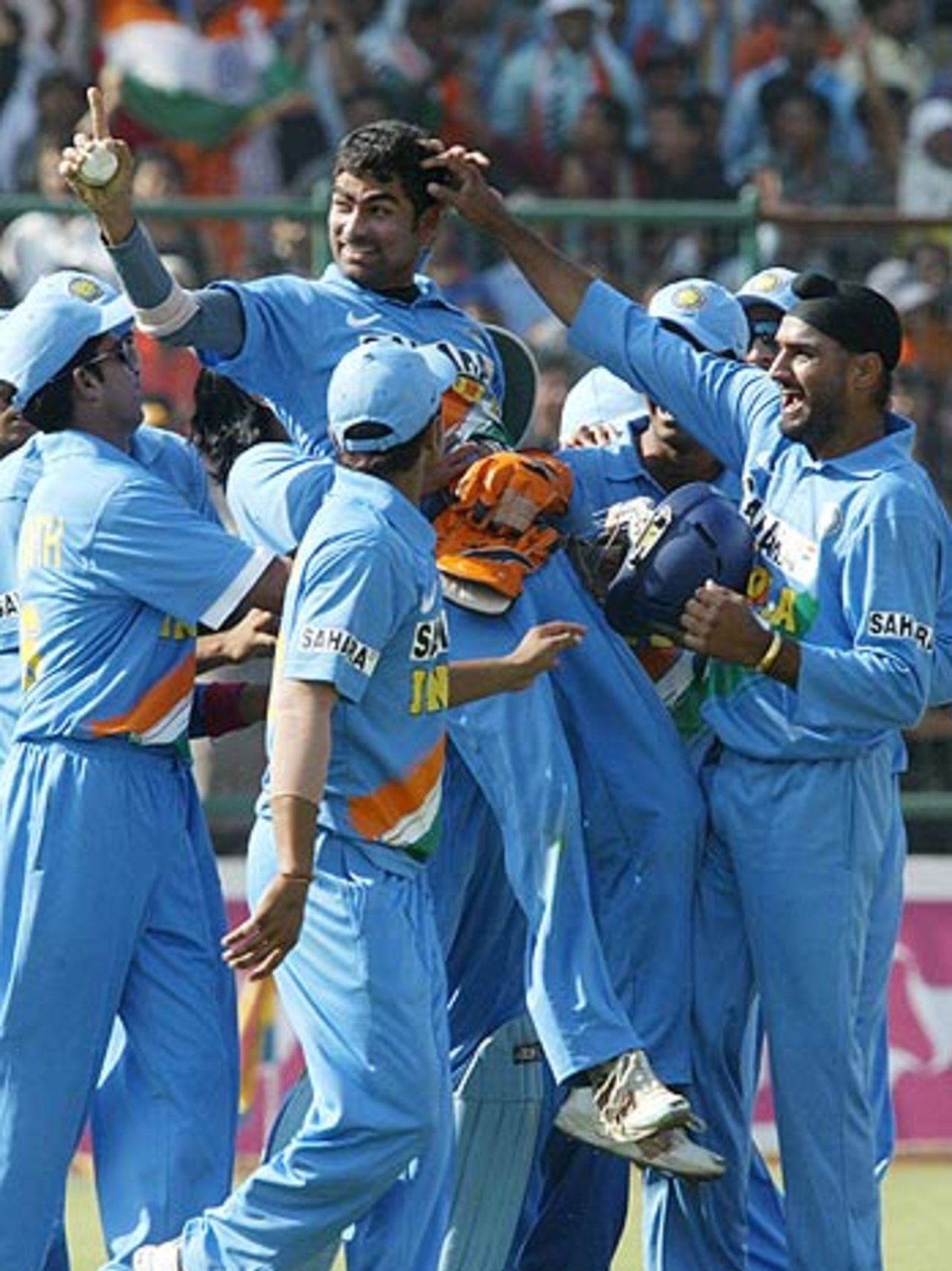 Indians celebrate their 39-run win, India v England, 1st ODI, New Delhi, March 28 2006