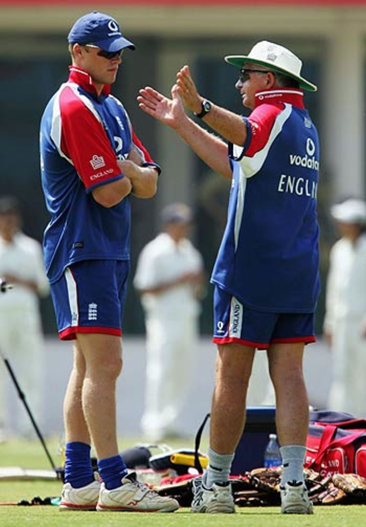 Andrew Flintoff listens while coach Duncan Fletcher makes a point, Delhi, March 30, 2006
