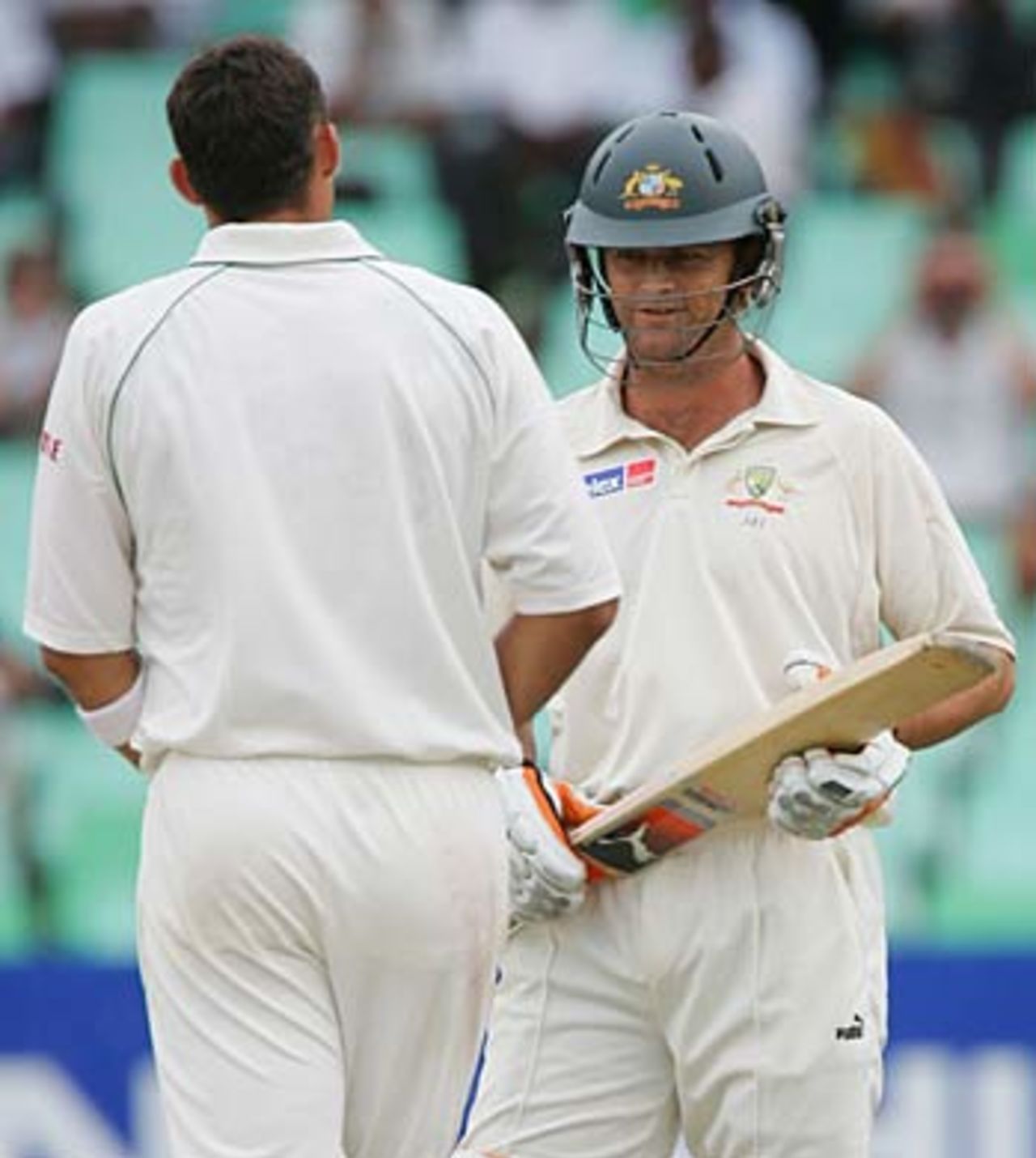 Andre Nel and Adam Gilchrist exchange opinions. Gilchrist had just smacked him for 22 in an over, but Nel was determined to have the final say, South Africa v Australia, 2nd Test, Durban, March 27, 2006