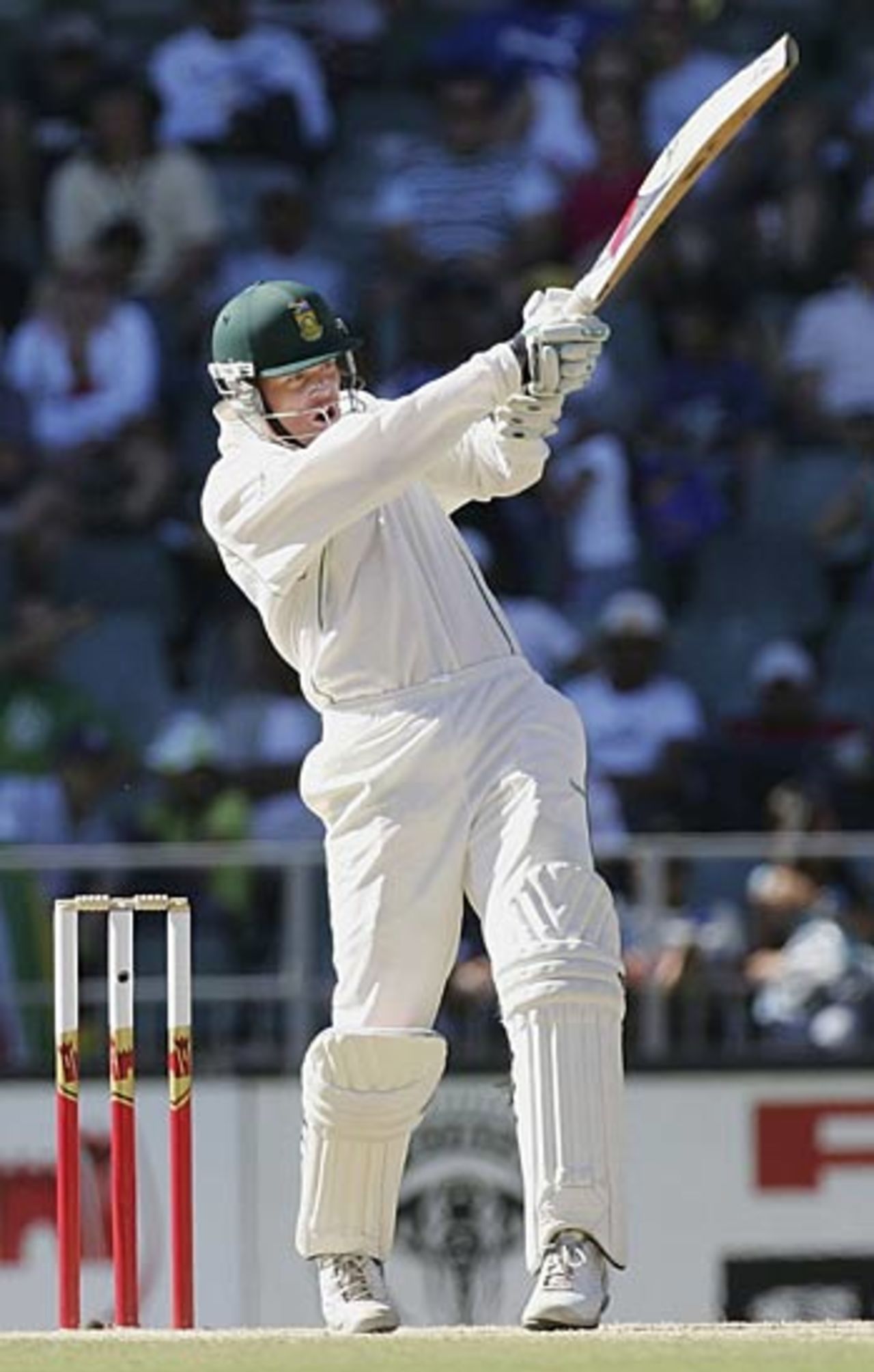 Shaun Pollock clubs one of his five boundaries during his vital 44, South Africa v Australia, 3rd Test, Johannesburg, April 2, 2006