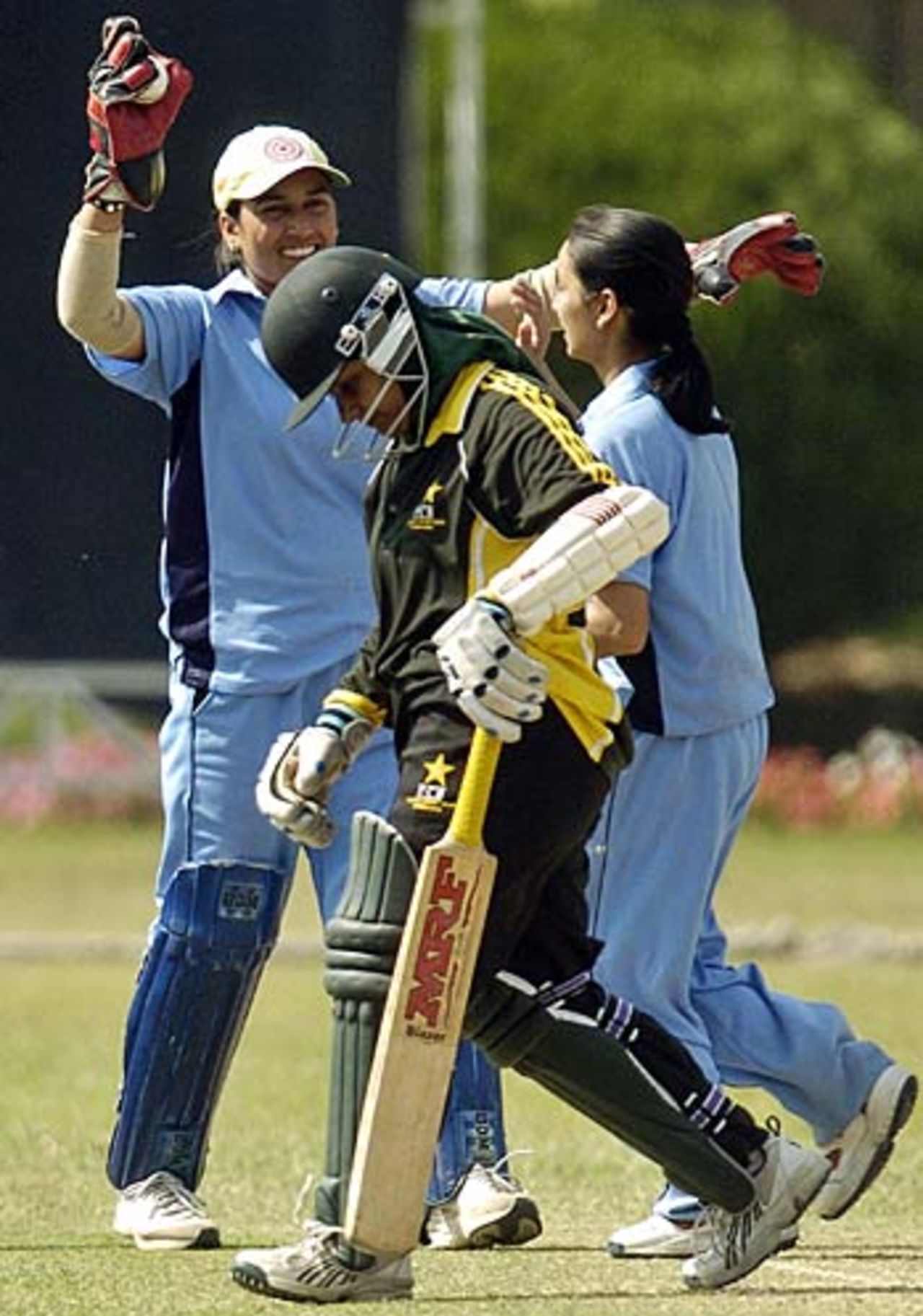 Delhi Blues Bod's wicketkeeper Gurdeep Kaur celebrates with her team-mates  after the dismissal of PCB Greens' Sana Javed , PCB Greens v Delhi Blues Bod,  Lahore, April 3, 2006