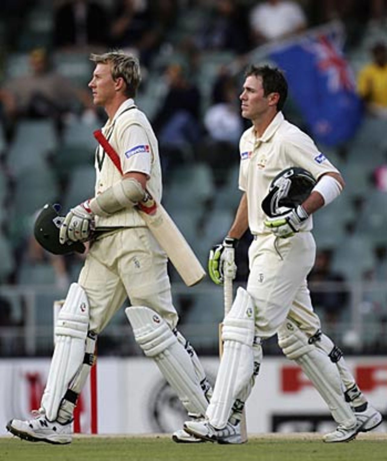 Brett Lee and Damien Martyn head for the dressing room as bad light ends play with them 44 runs short and four wickets left, South Africa v Australia, 3rd Test, Johannesburg, April 3, 2006