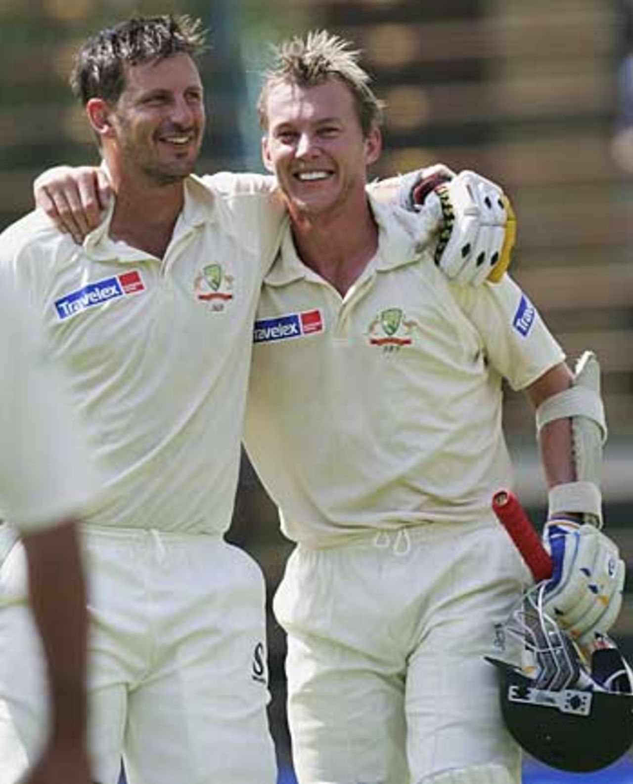 Michael Kasprowicz and Brett Lee can't hide their delight after edging Australia to victory by two wickets, South Africa v Australia, 3rd Test, Johannesburg, 5th day, April 4, 2006