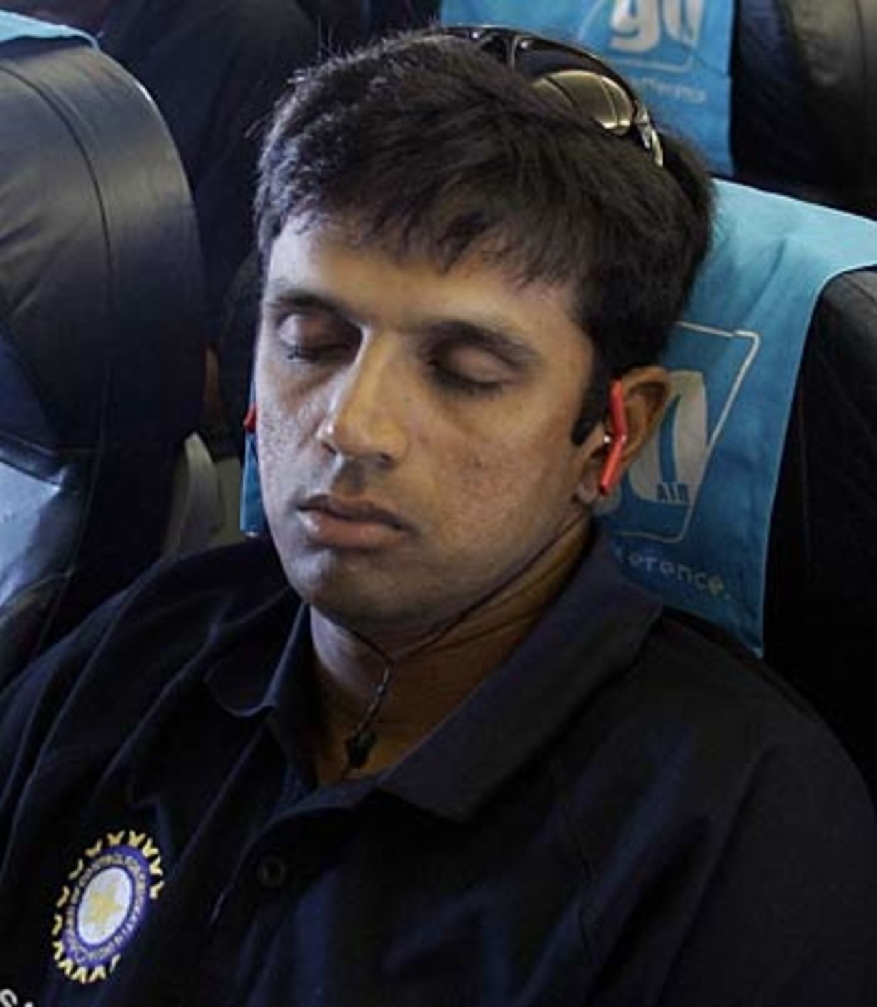 Rahul Dravid dozes on a flight from Goa to Cochin, April 4, 2006