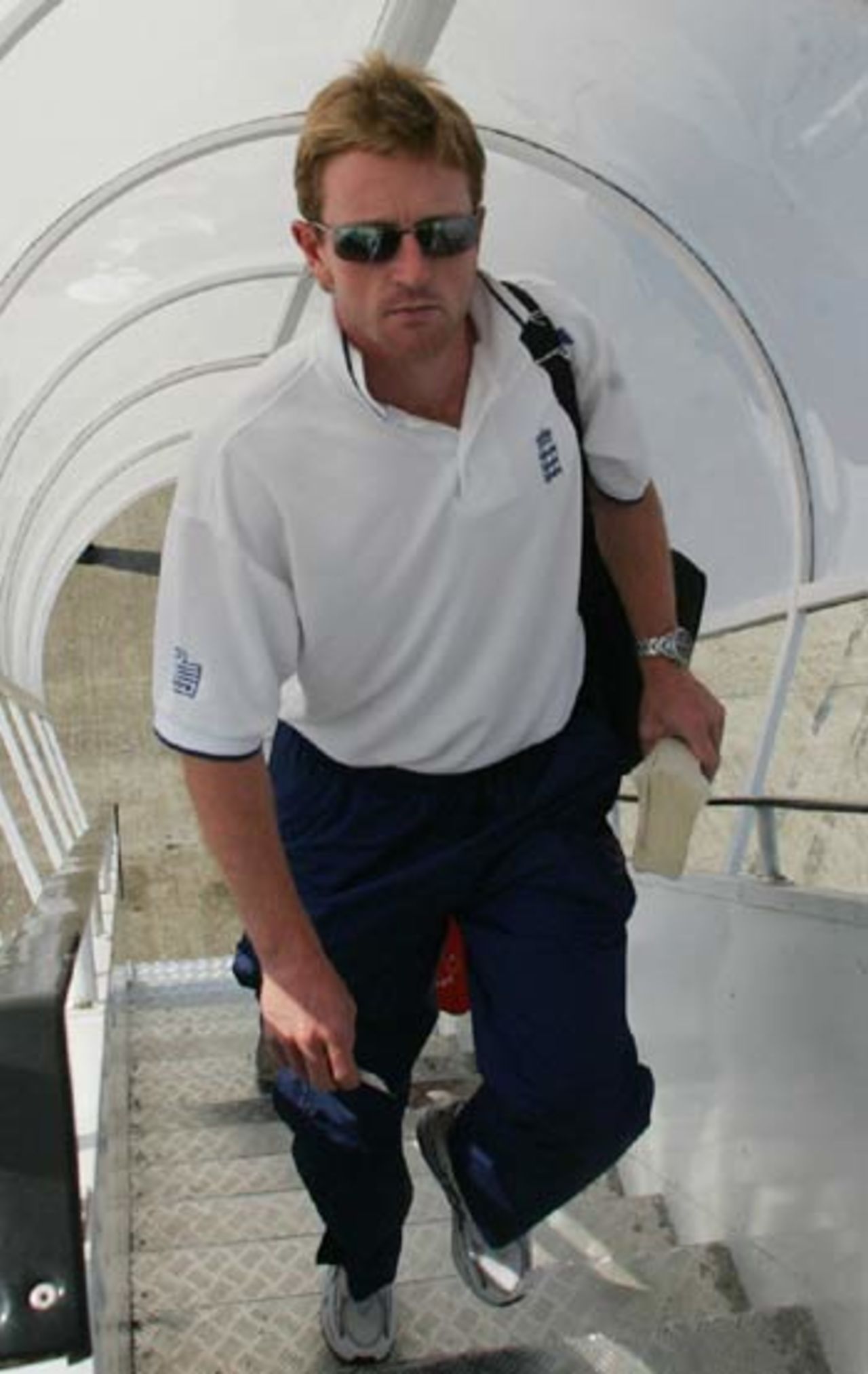 Another day, another plane: Paul Collingwood boards a flight from Goa to Cochin, April 4, 2006
