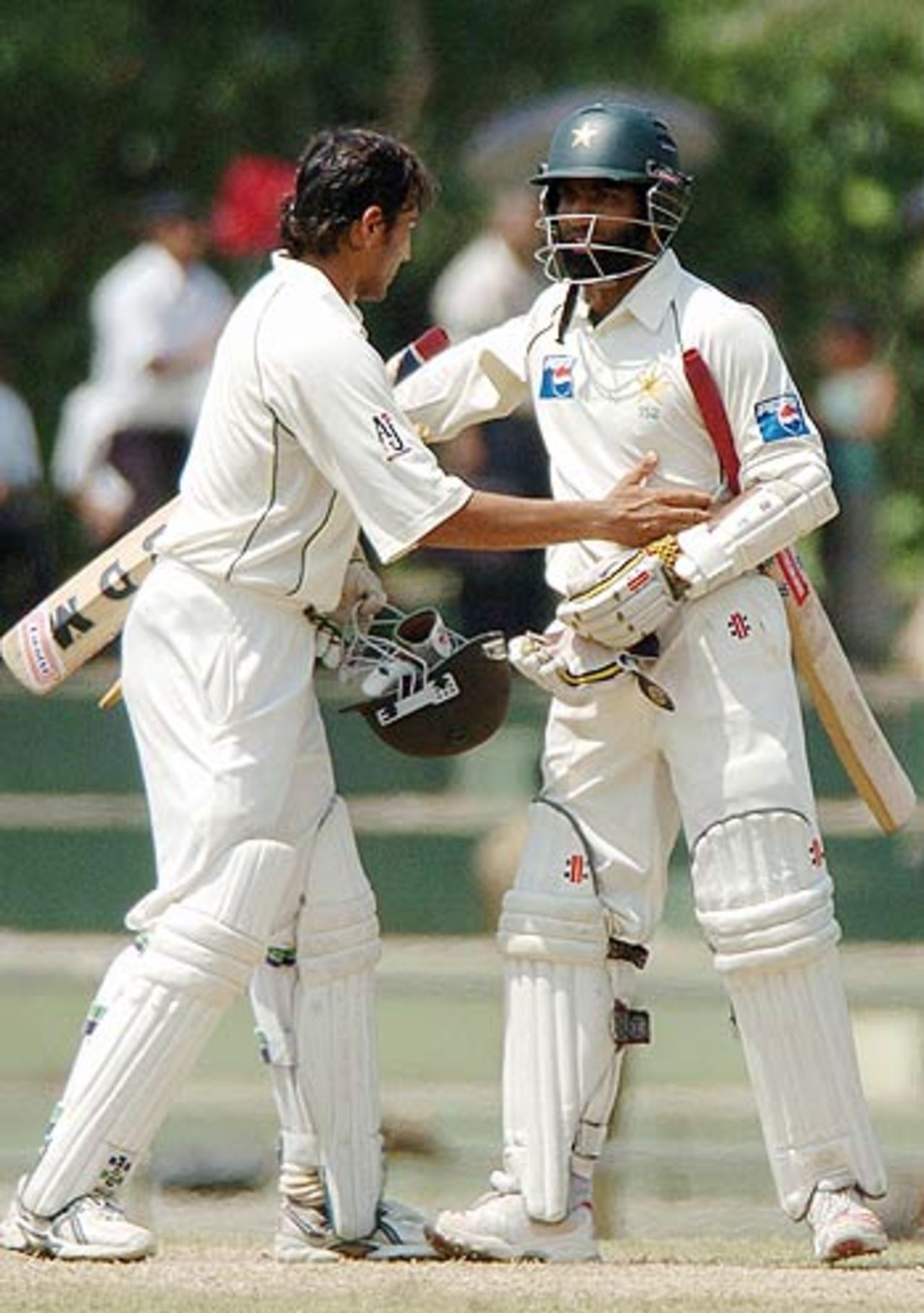 Younis Khan and Mohammad Yousuf congratulate each other after the winning runs, Sri Lanka v Pakistan, 2nd Test, Kandy, 3rd day, April 5, 2006