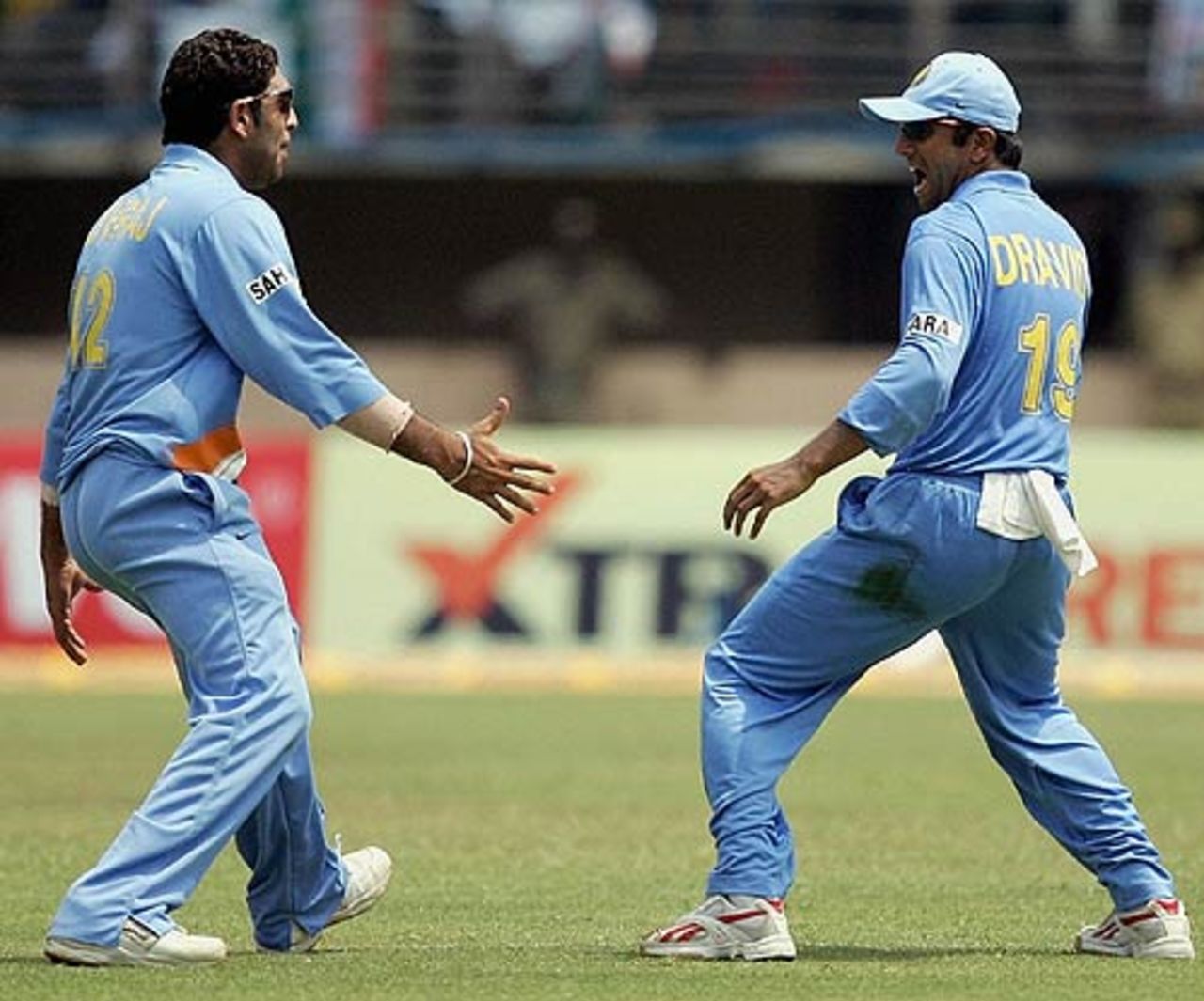 Rahul Dravid and Yuvraj Singh celebrate Andrew Flintoff's dismissal, India v England, 4th ODI, Kochi, April 6, 2006