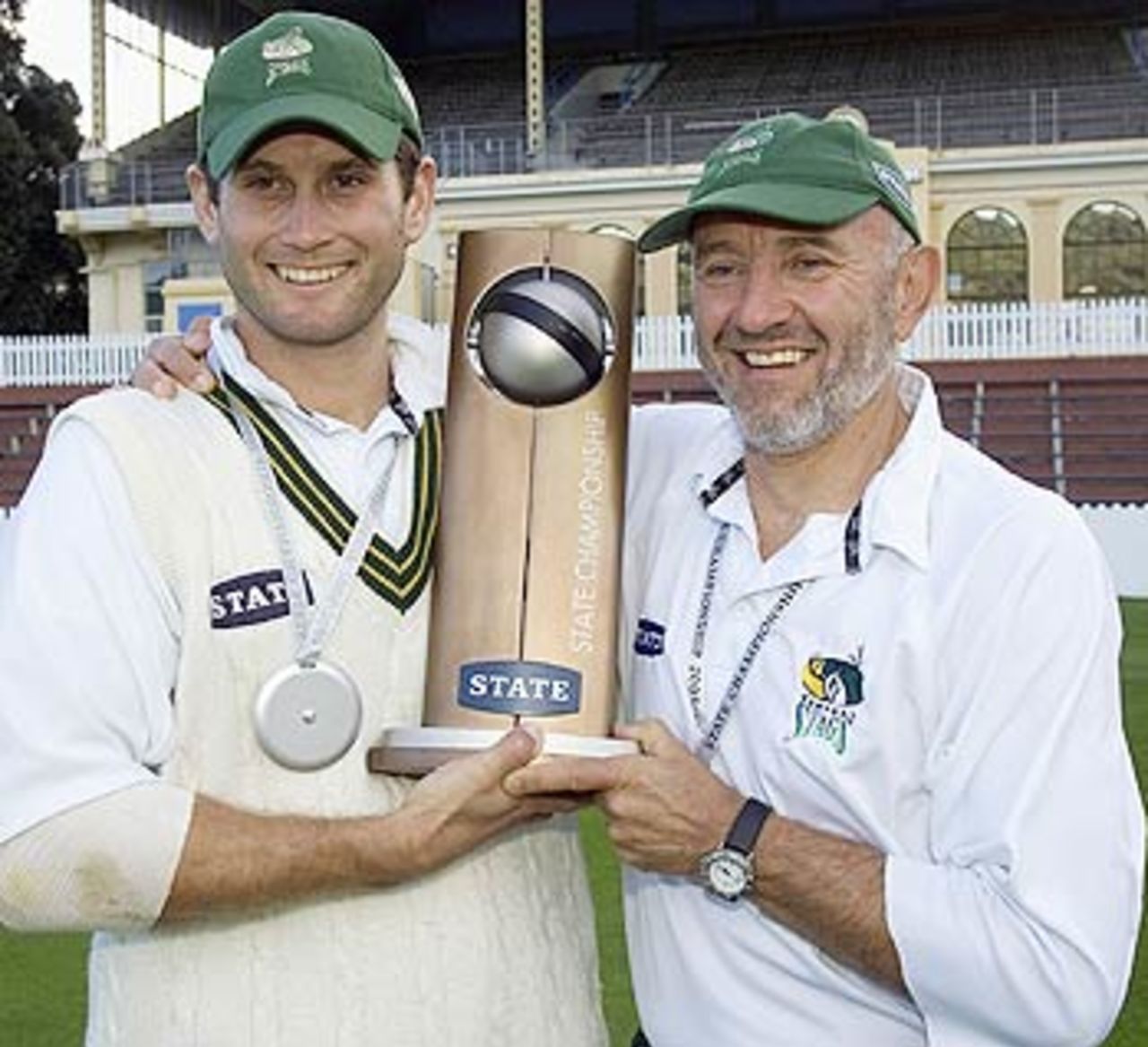 Jarrod Englefield and Graham Barlow of Central Districts hold the State Championship cricket trophy, Wellington v Central Districts, State Championship final, Basin Reserve,  April 7, 2006