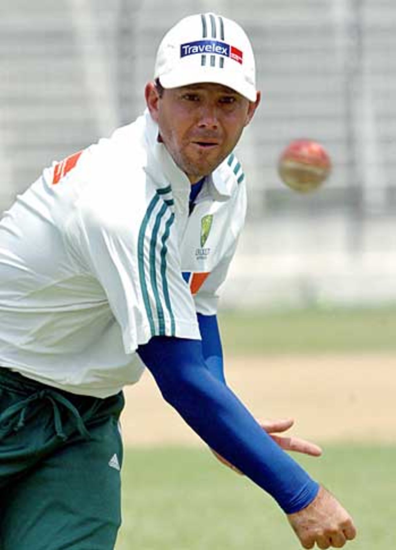 Ricky Ponting practises his throwing during a net session at Fatullah, April 7, 2006