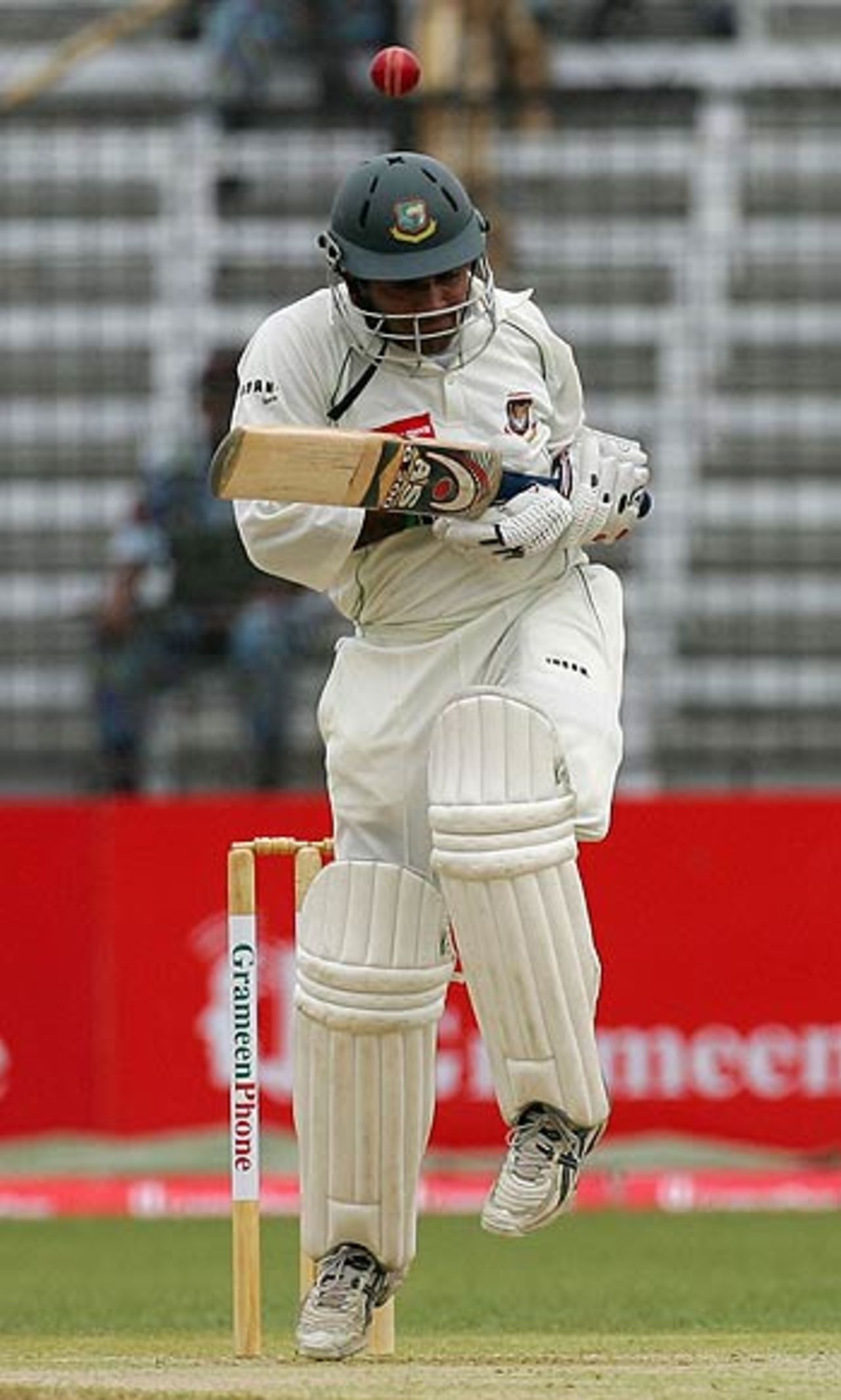 Javed Omar ducks a bouncer from Brett Lee, Bangladesh v Australia, 1st Test, Fatullah, April 9, 2006