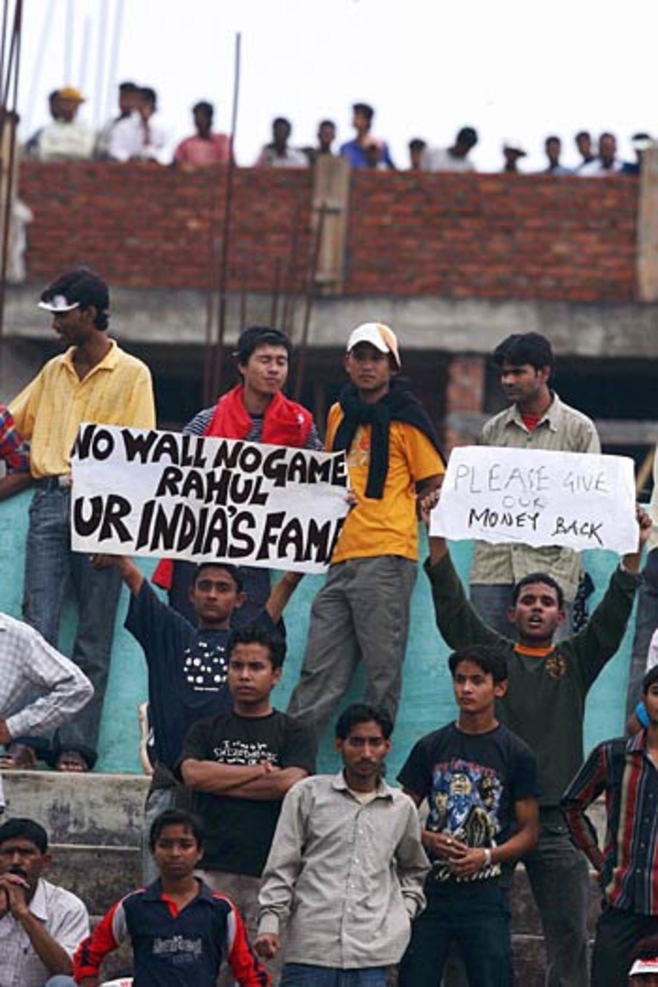 Restive crowd hold banners of protest, India v England, 5th ODI, Guwahati,  April 9, 2006