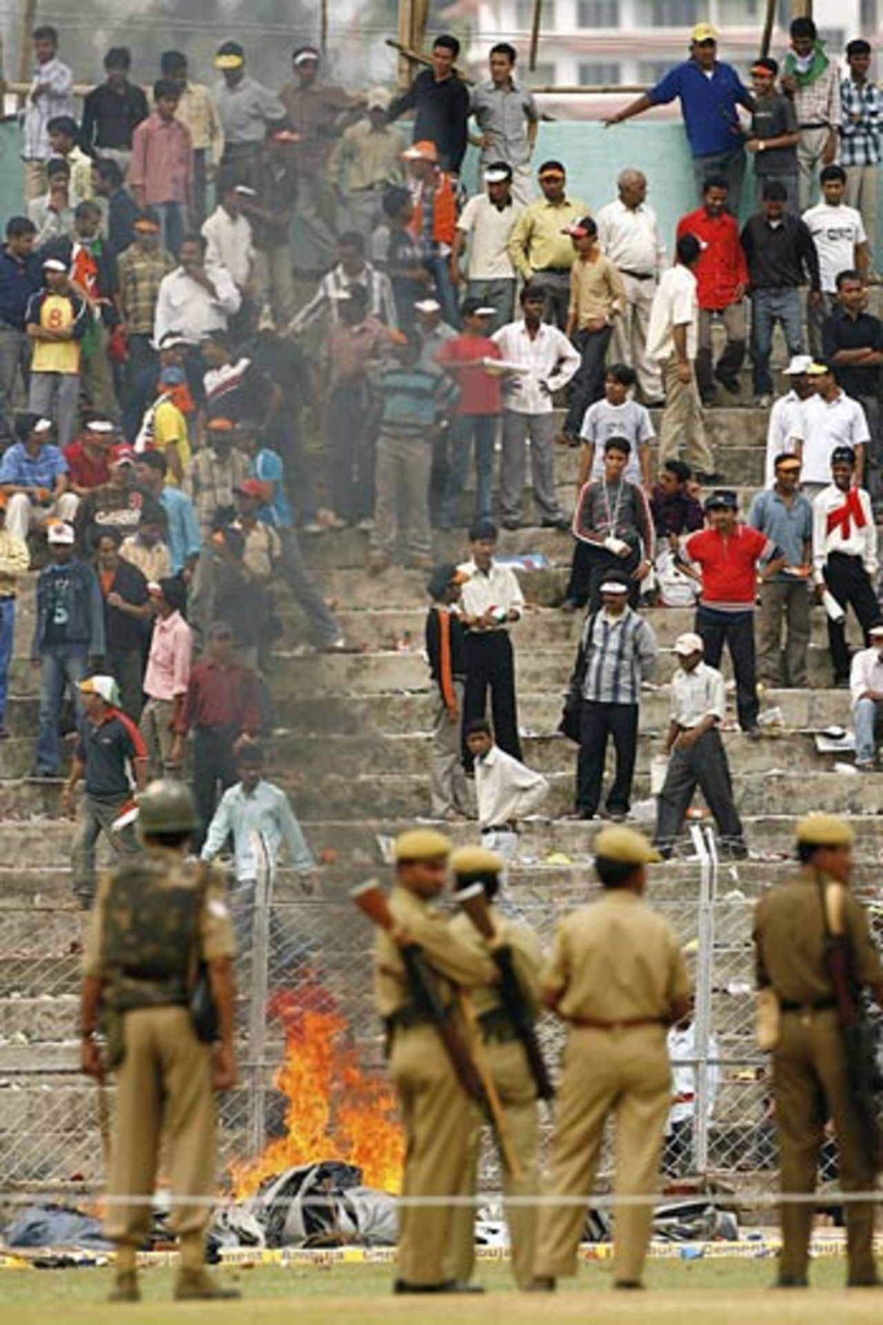 Violent scenes broke out as the crowd's anger grew after the game was abandoned, India v England, 5th ODI, Guwahati,  April 9, 2006