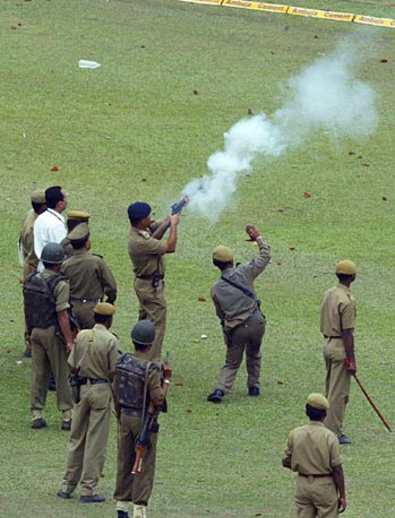 Police fire tear gas into the stands, India v England, 5th ODI, Guwahati,  April 9, 2006