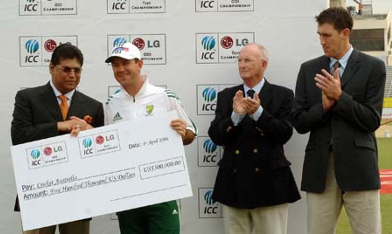 Australia captain Ricky Ponting collects a cheque for $US 500,000 from ICC Director Mohammad Ali Asghar on behalf of Cricket Australia for topping the LG ICC Test Championship and LG ICC ODI Championship for the second year in a row. Also pictured are Cricket Australia Chairman Creagh O'Connor and Chief Executive James Sutherland (far right).