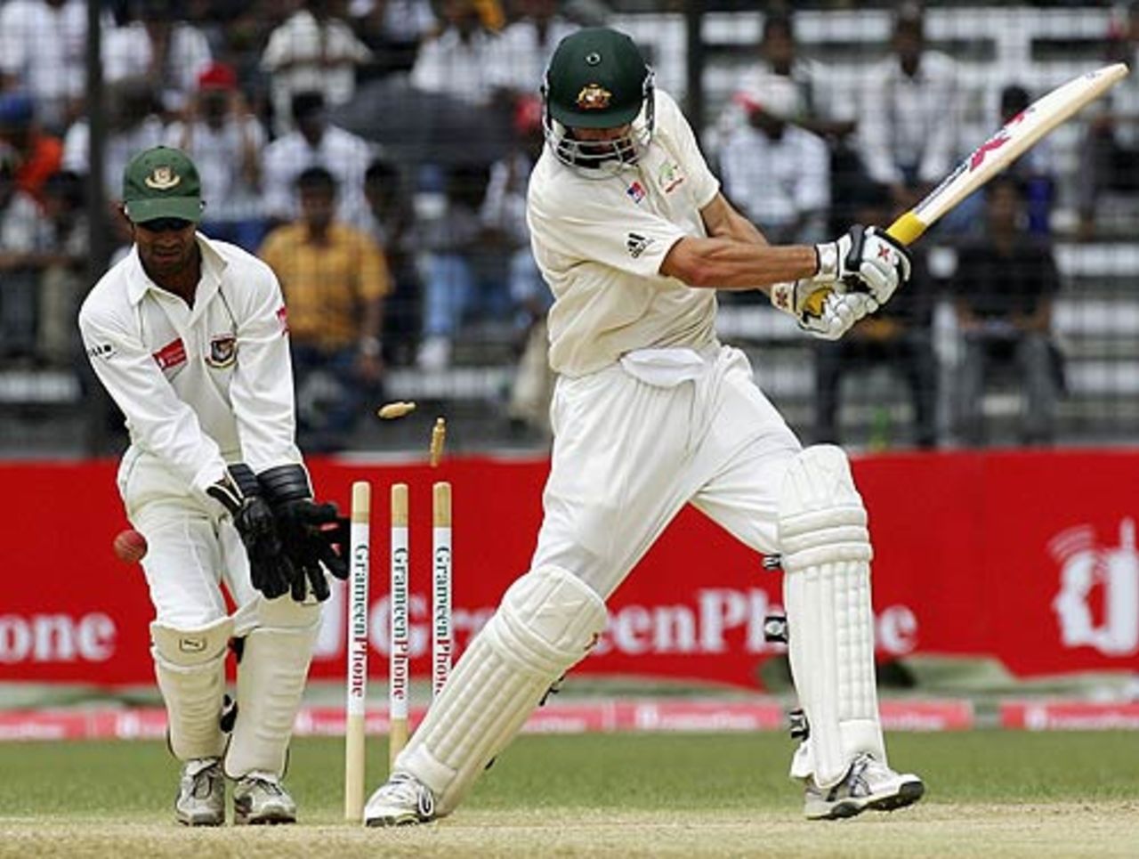 Jason Gillespie swings and misses it completely, 
Bangladesh v Australia, 1st Test, Fatullah, 3rd day, April 11 2006