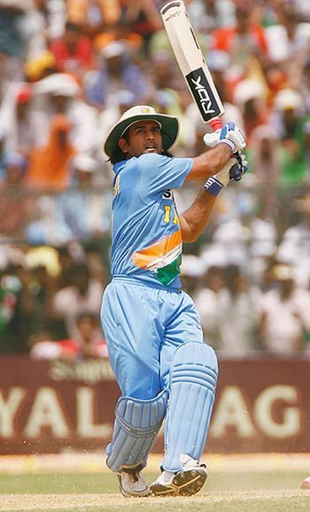 Mahendra Singh Dhoni hammers a six almost out of the stadium, India v England, 6th ODI, Jamshedpur, April 12, 2006