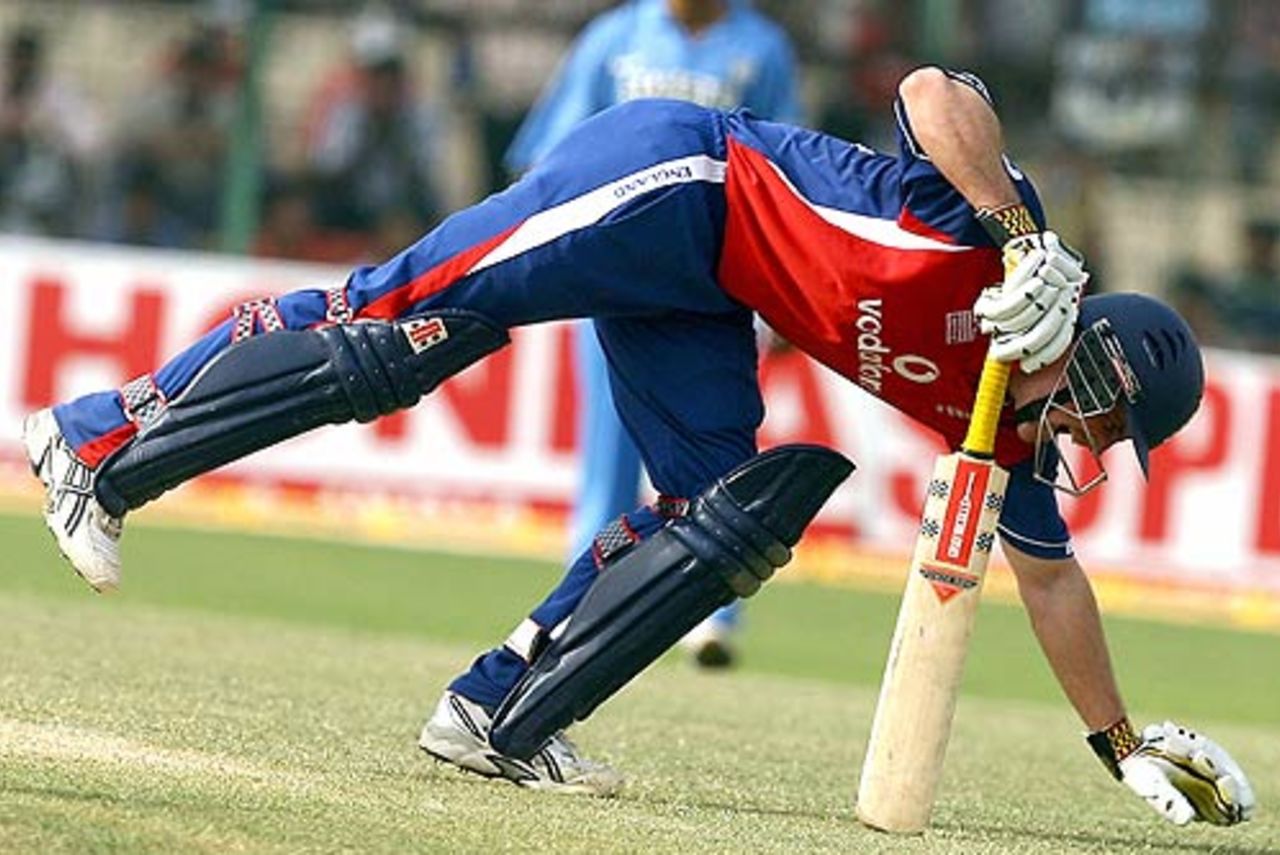 Andrew Strauss bends over in pain, India v England, 6th ODI, Jamshedpur, April 12, 2006