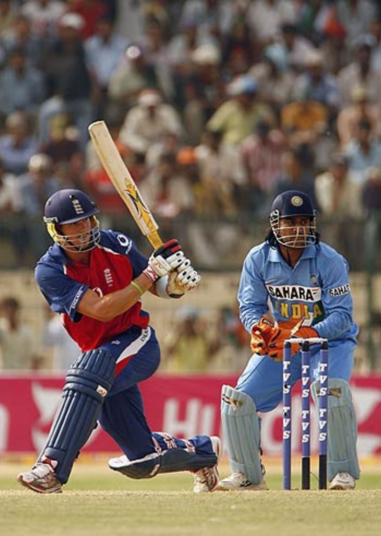 Kevin Pietersen sweeps during his 33, India v England, 6th ODI, Jamshedpur, April 12, 2006
