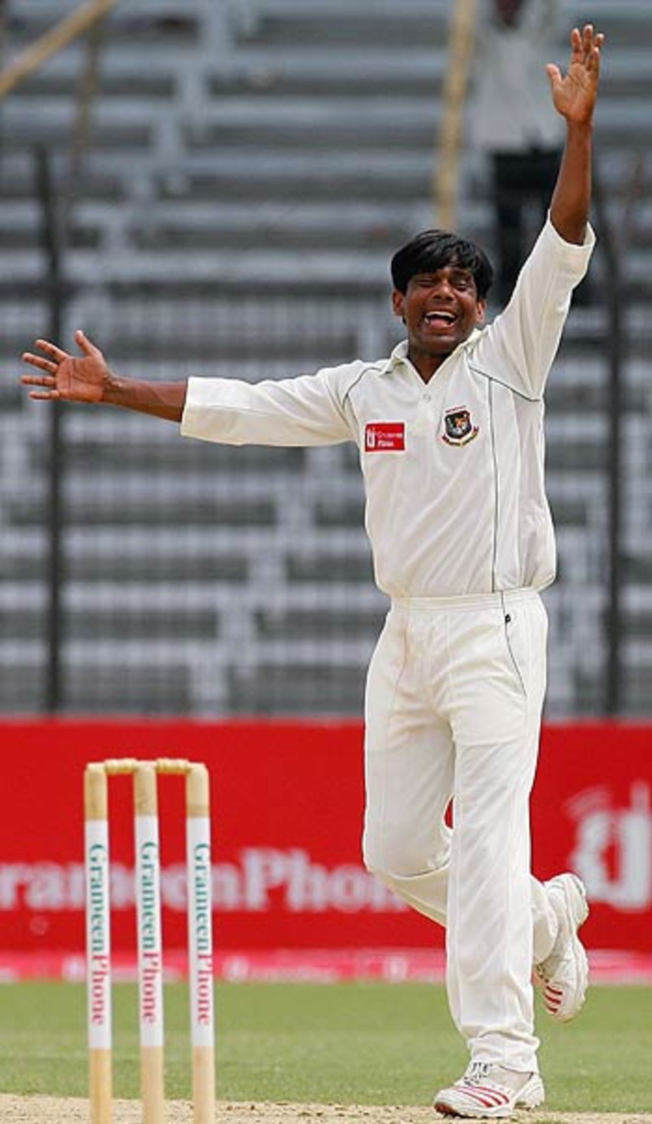 Mohammad Rafique celebrates after bowling Adam Gilchrist, Bangladesh v Australia, 1st Test, Fatullah, 5th day, April 13, 2006